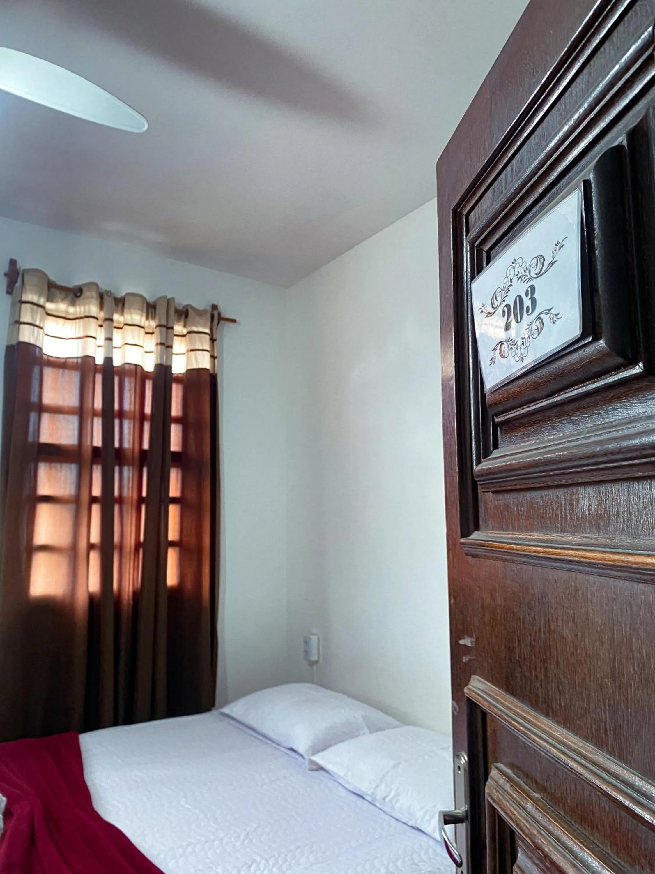 Bed in Pousada Flor de Lis