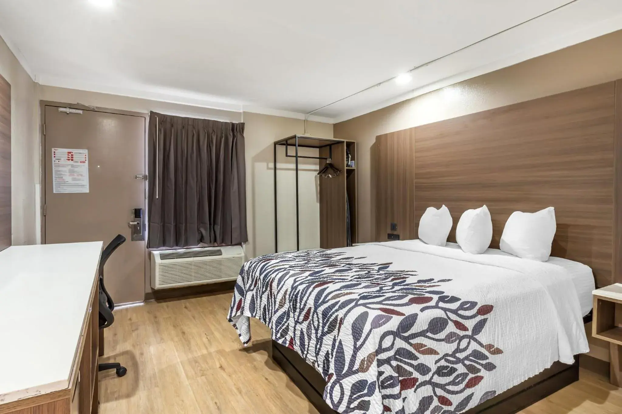 Photo of the whole room, Bed in Red Roof Inn Raleigh Northeast - Downtown Photo of the whole room, Bed in Red Roof Inn Raleigh Northeast - Downtown