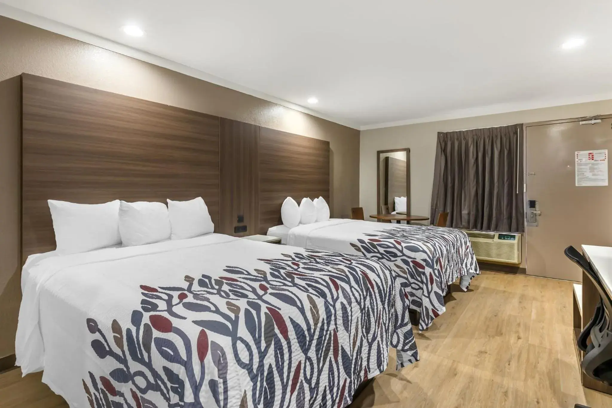 Photo of the whole room, Bed in Red Roof Inn Raleigh Northeast - Downtown Photo of the whole room, Bed in Red Roof Inn Raleigh Northeast - Downtown