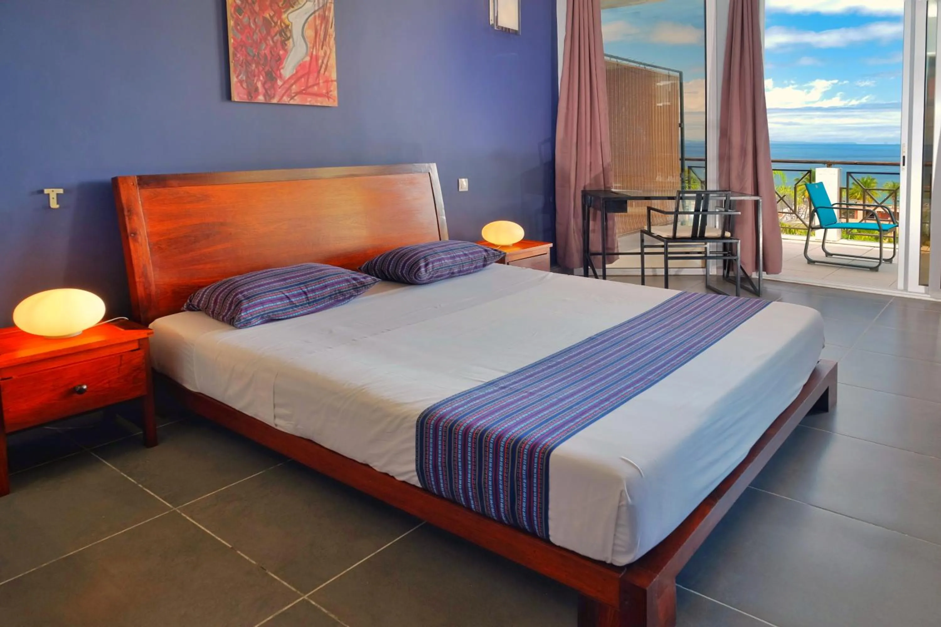 Photo of the whole room, Bed in Hôtel Villa Les Orchidées