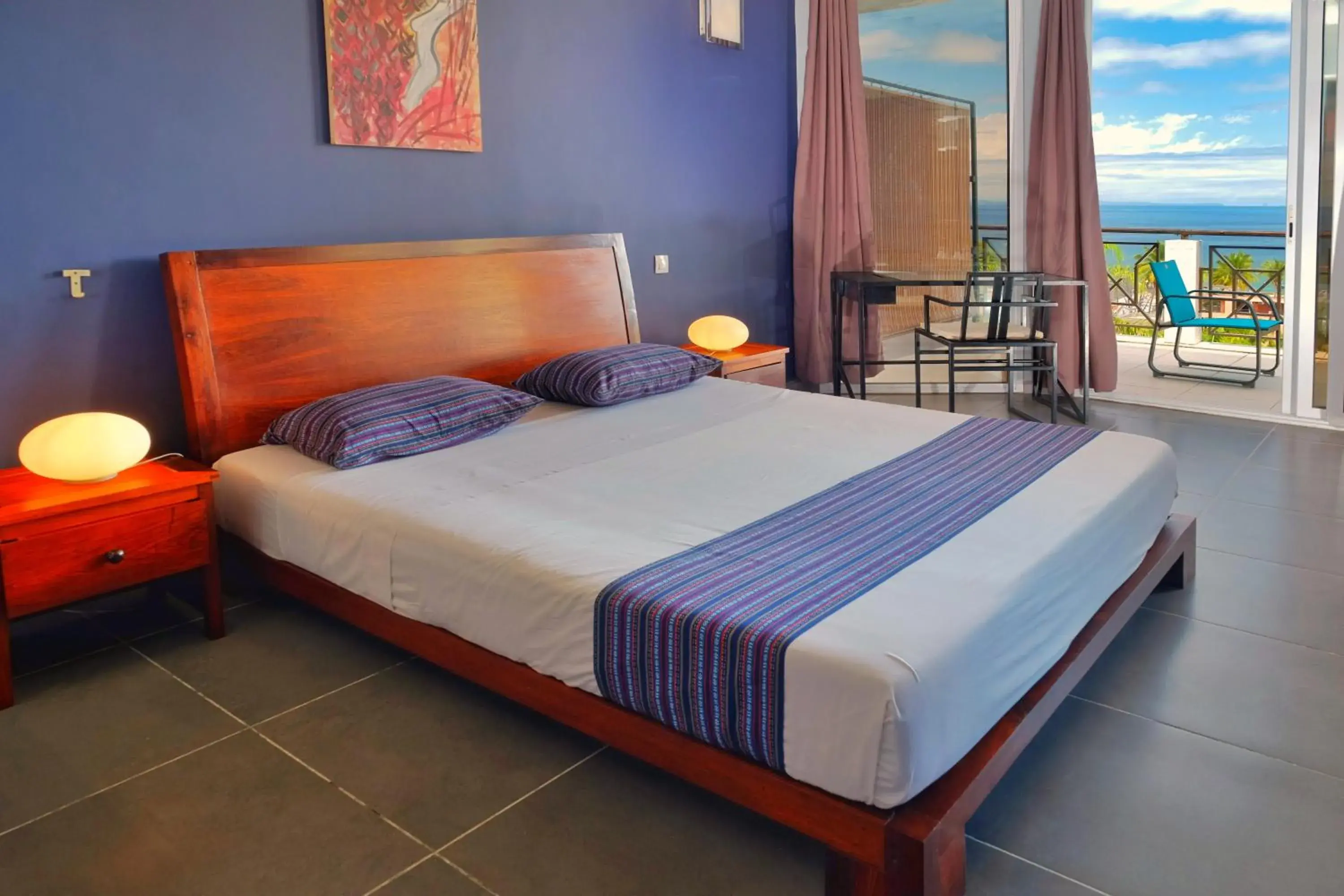 Grande chambre double avec terrasse vue panoramique sur mer, piscine et Jardin in Hôtel Villa Les Orchidées Grande chambre double avec terrasse vue panoramique sur mer, piscine et Jardin in Hôtel Villa Les Orchidées