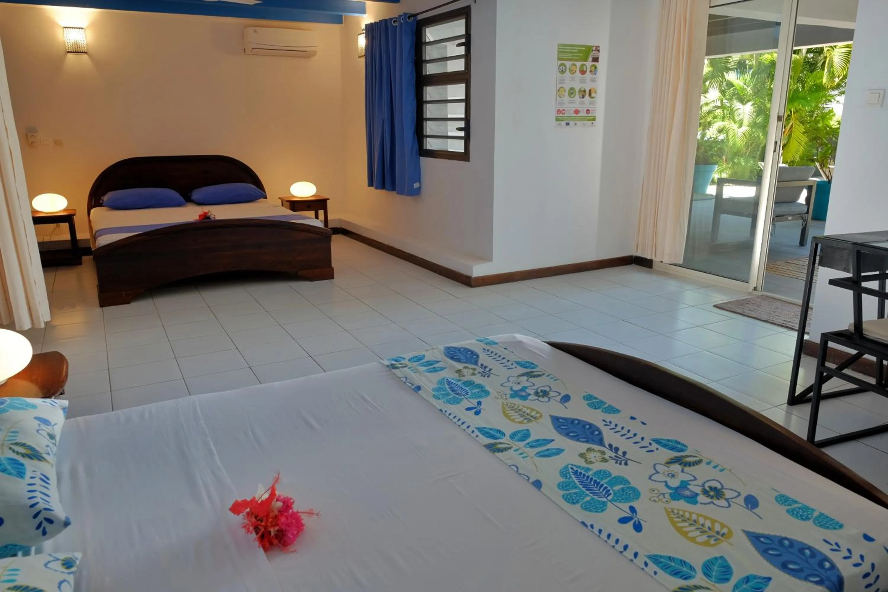 Photo of the whole room, Bed in Hôtel Villa Les Orchidées