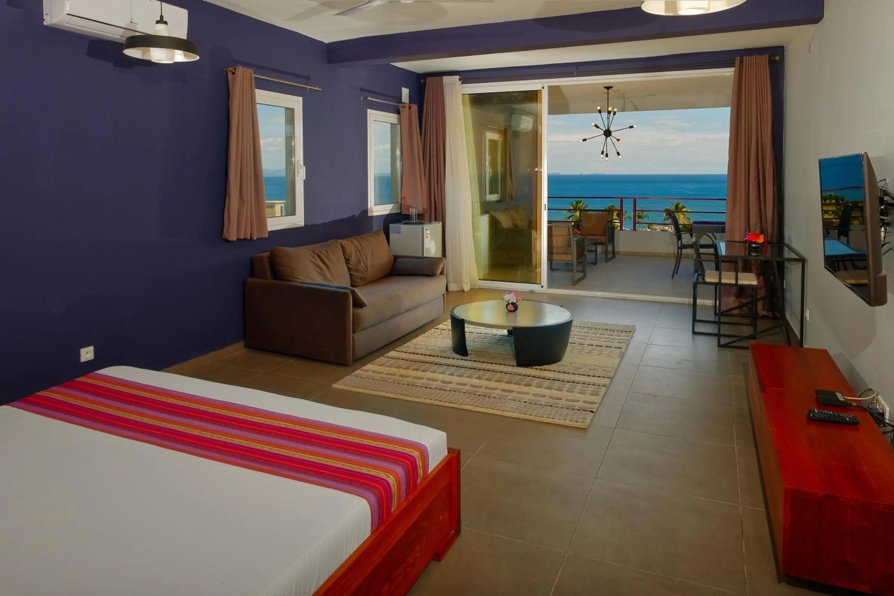 Photo of the whole room, Bed in Hôtel Villa Les Orchidées
