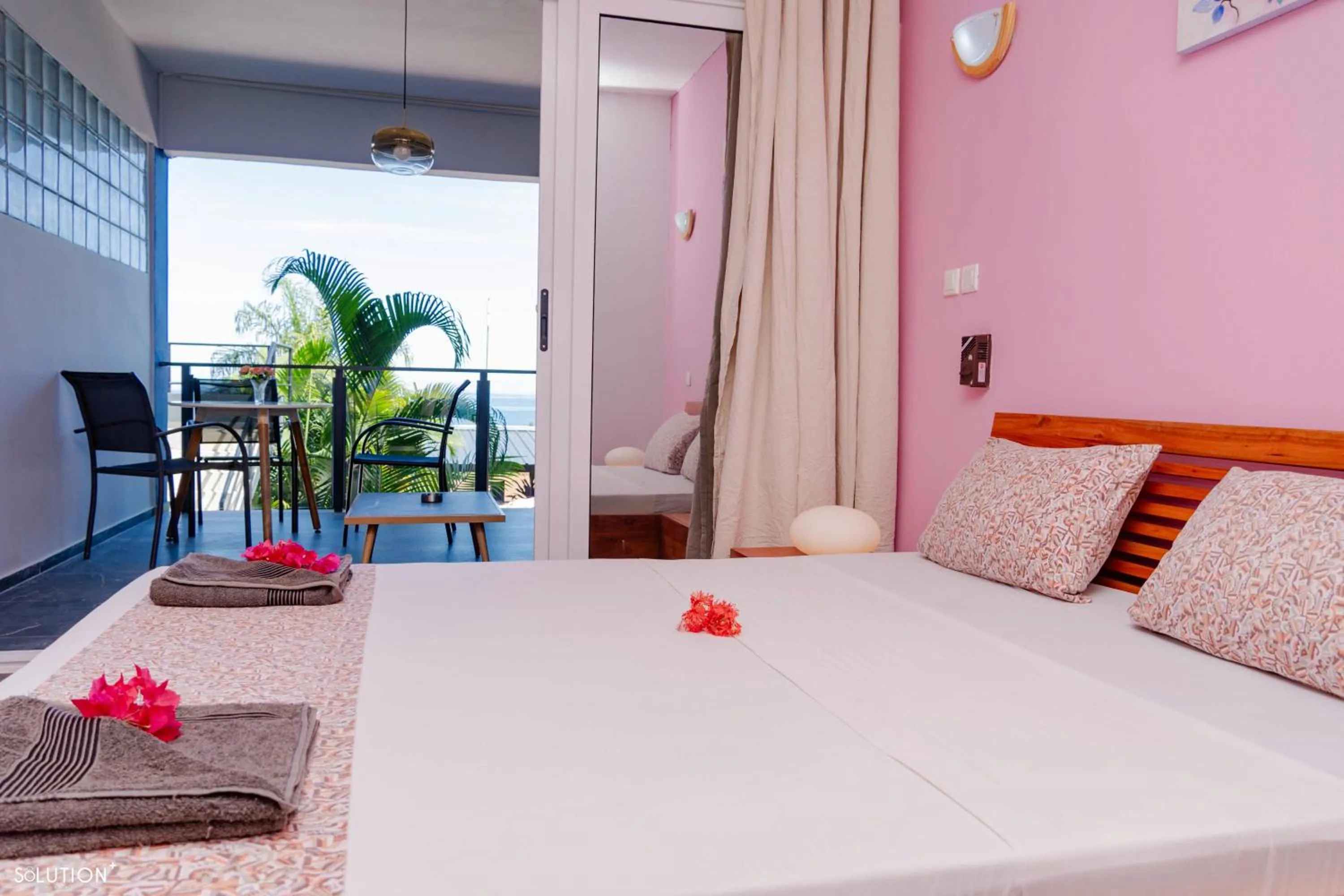 Bed in Hôtel Villa Les Orchidées