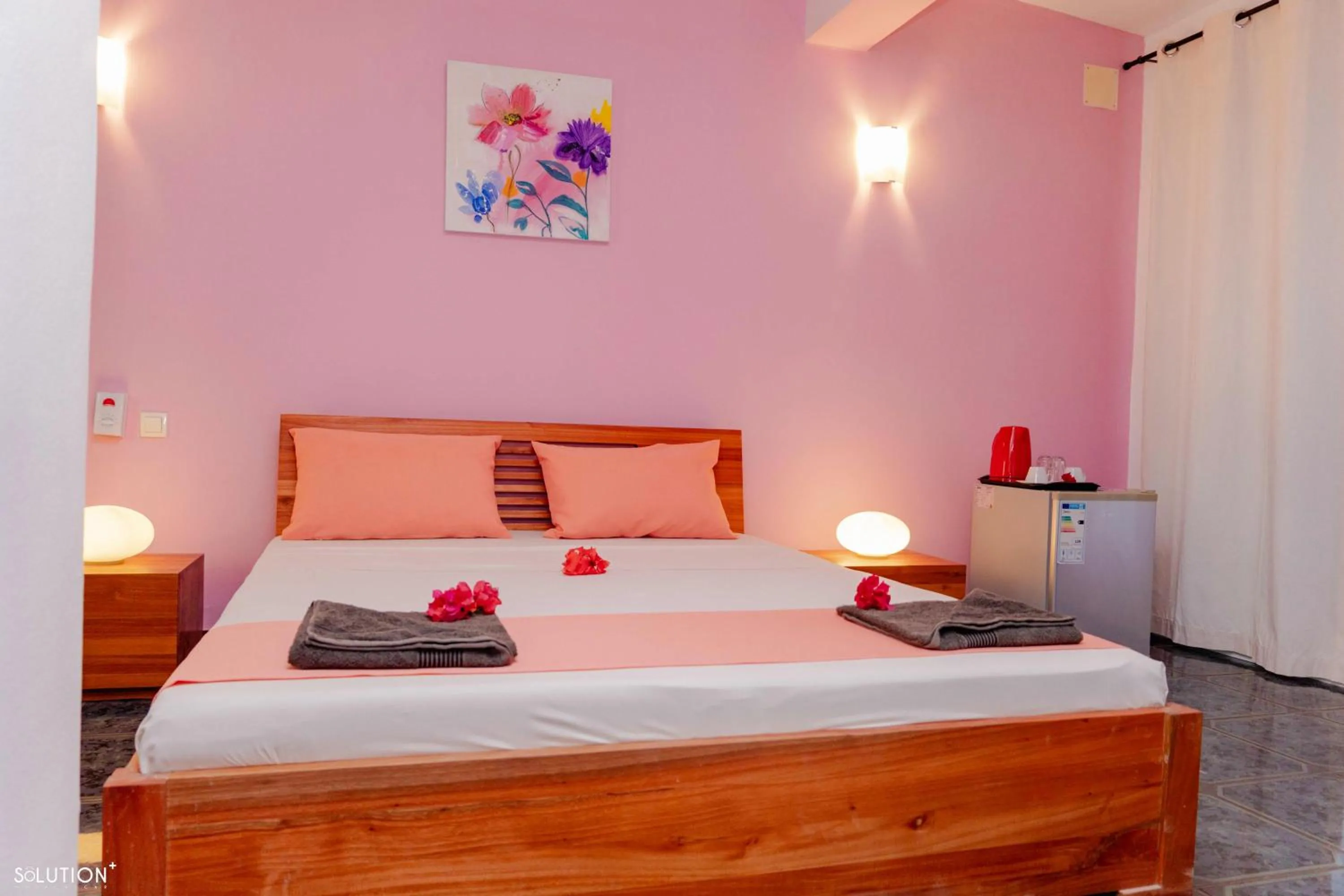 Bed in Hôtel Villa Les Orchidées