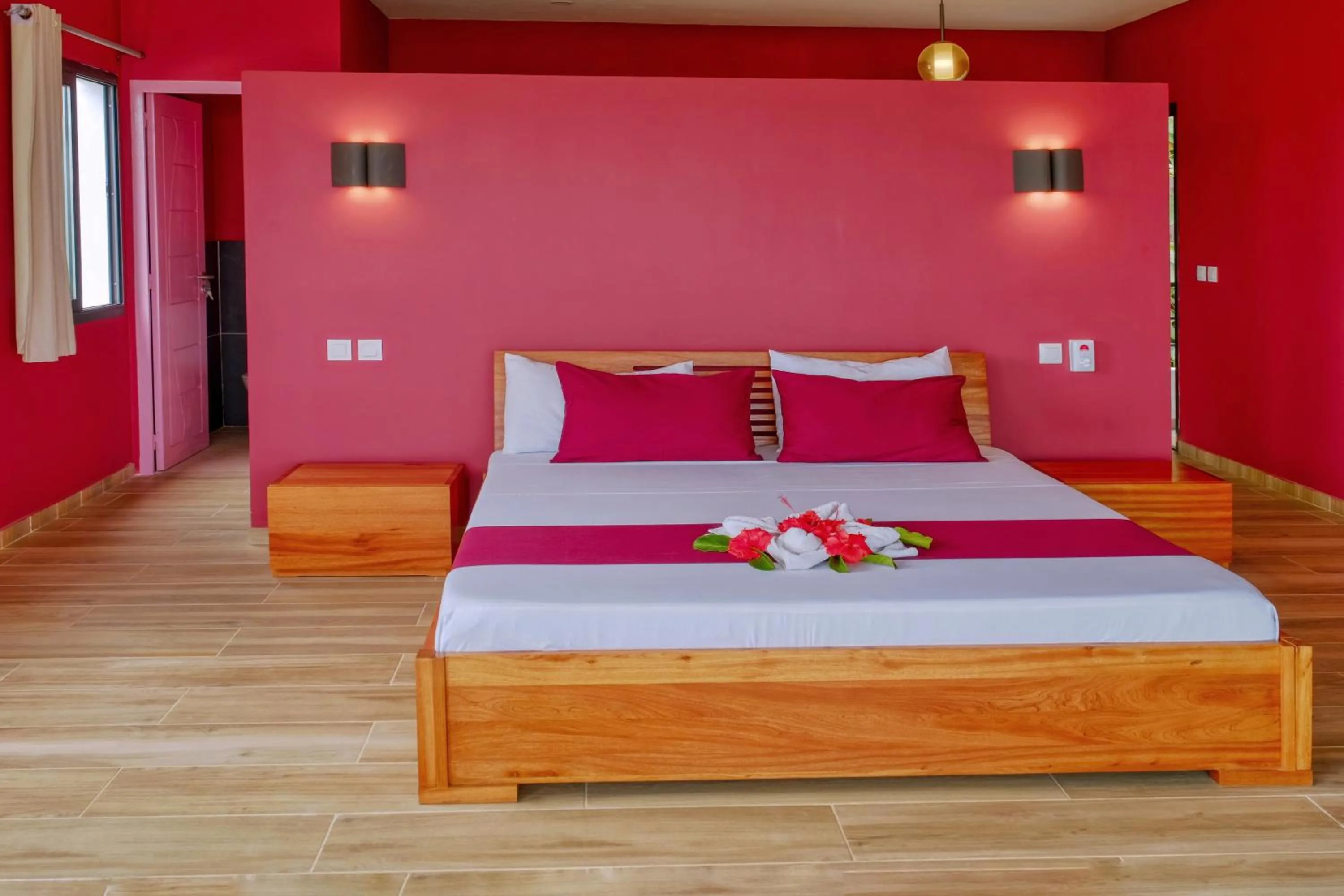 Photo of the whole room, Bed in Hôtel Villa Les Orchidées
