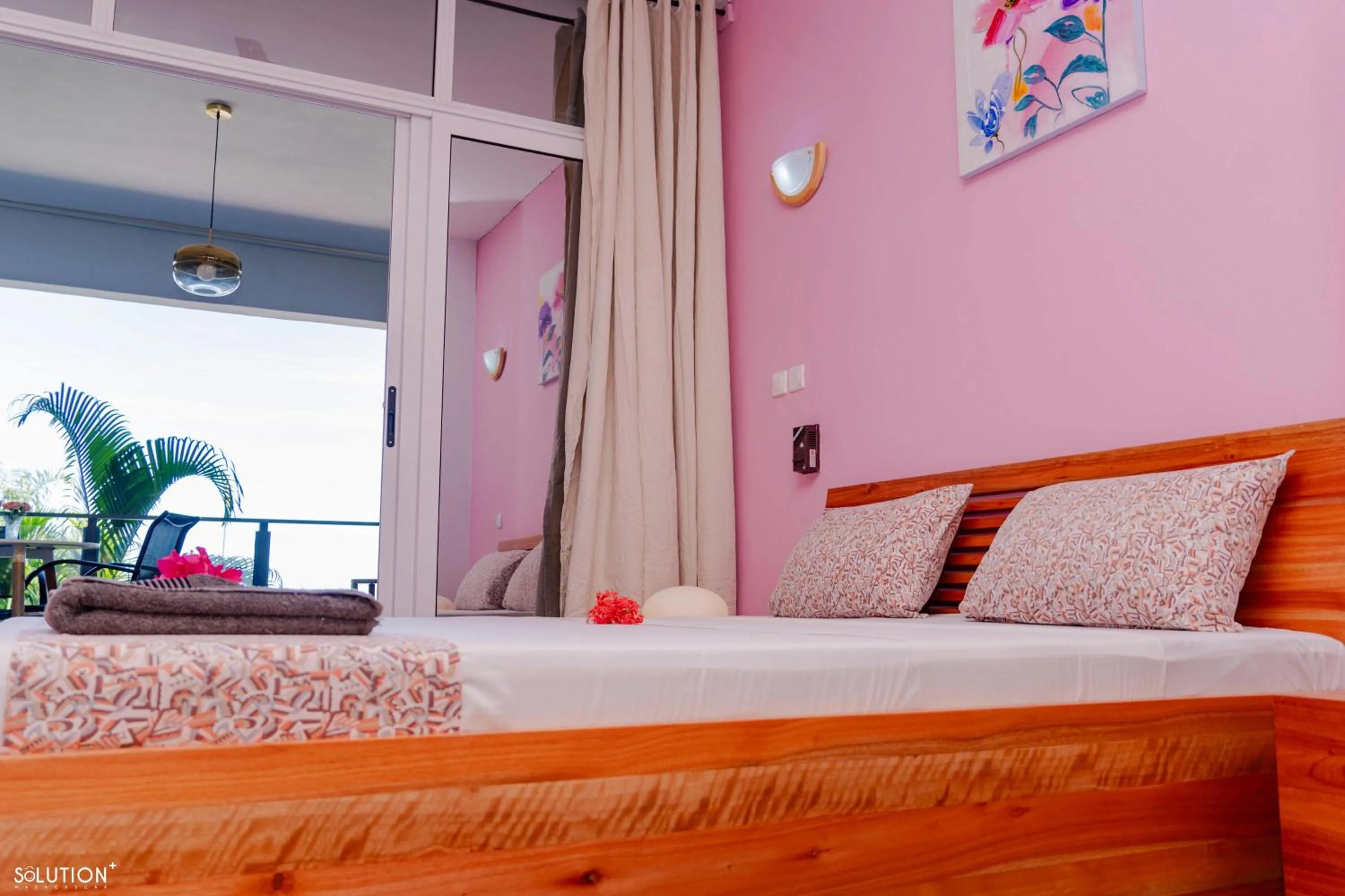 Bed in Hôtel Villa Les Orchidées