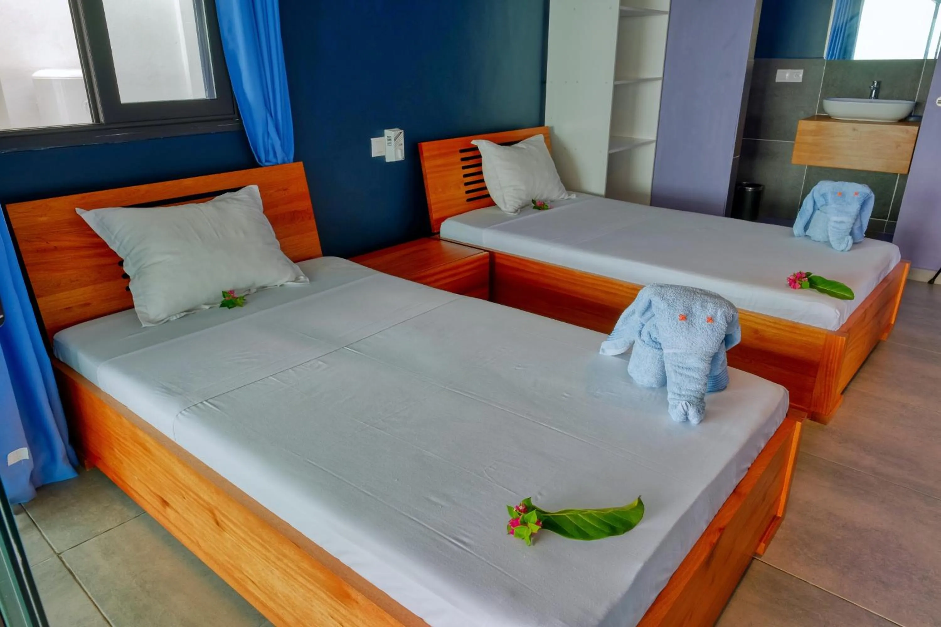 Photo of the whole room, Bed in Hôtel Villa Les Orchidées