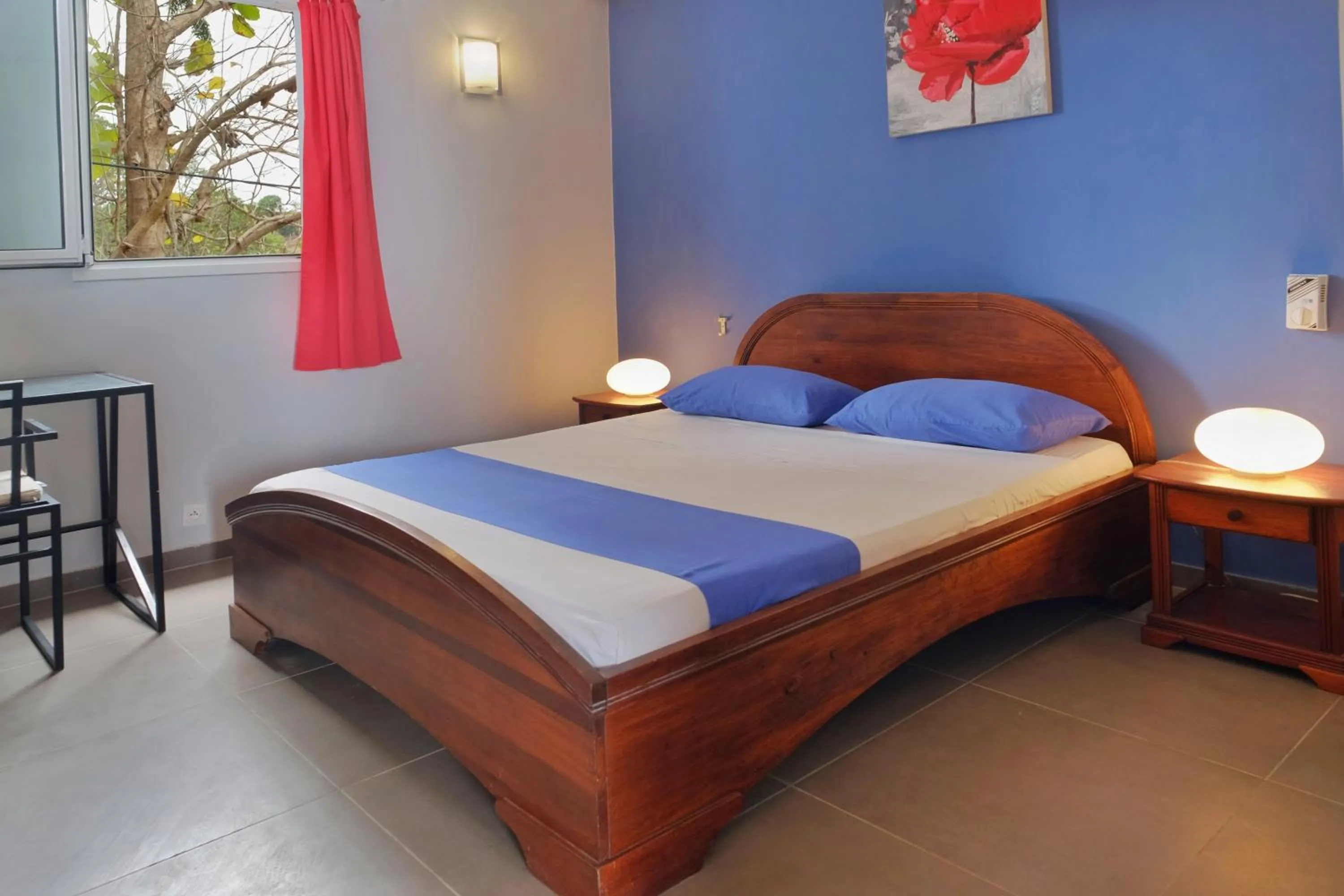 Bed in Hôtel Villa Les Orchidées