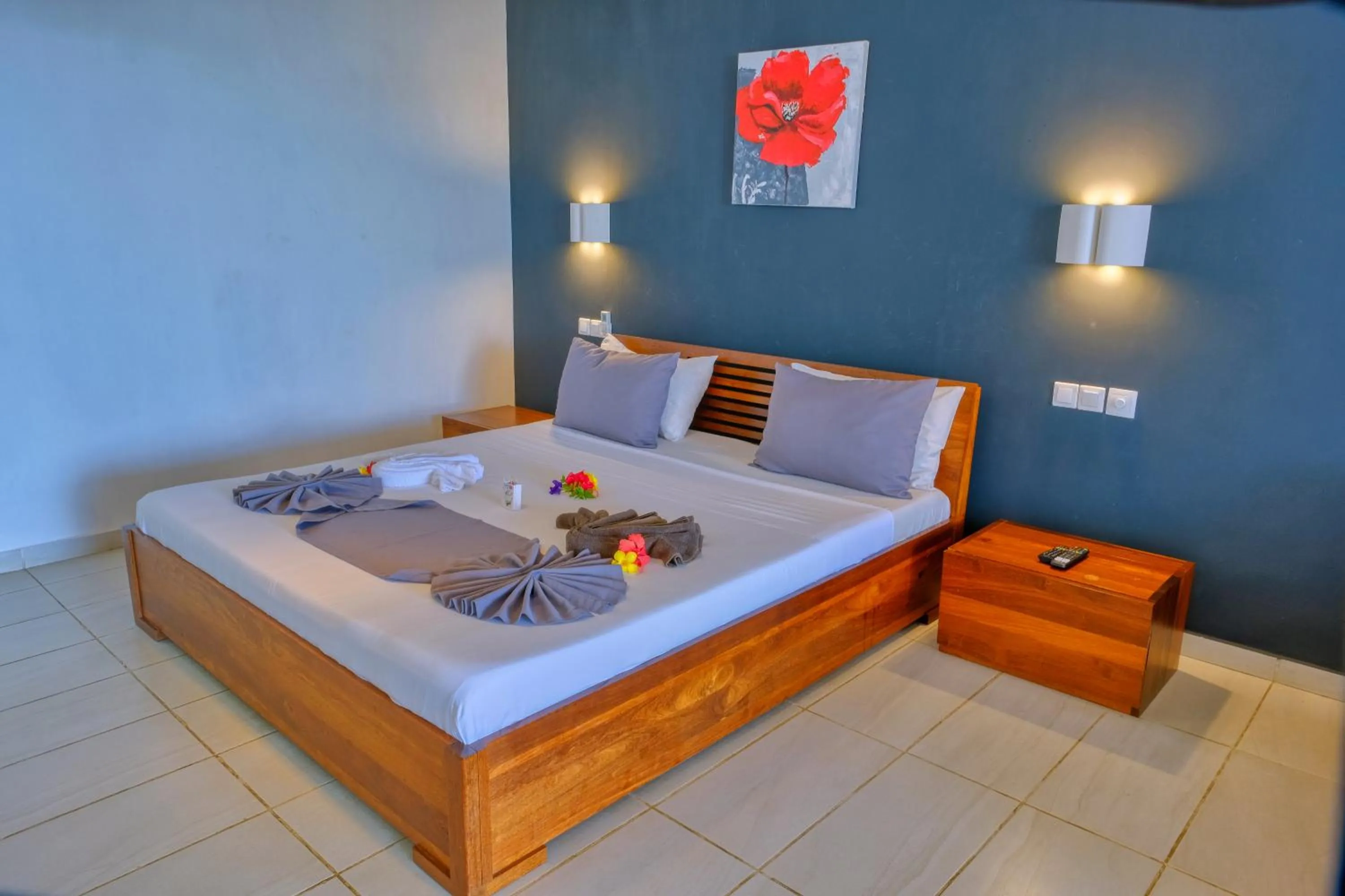 Bed in Hôtel Villa Les Orchidées