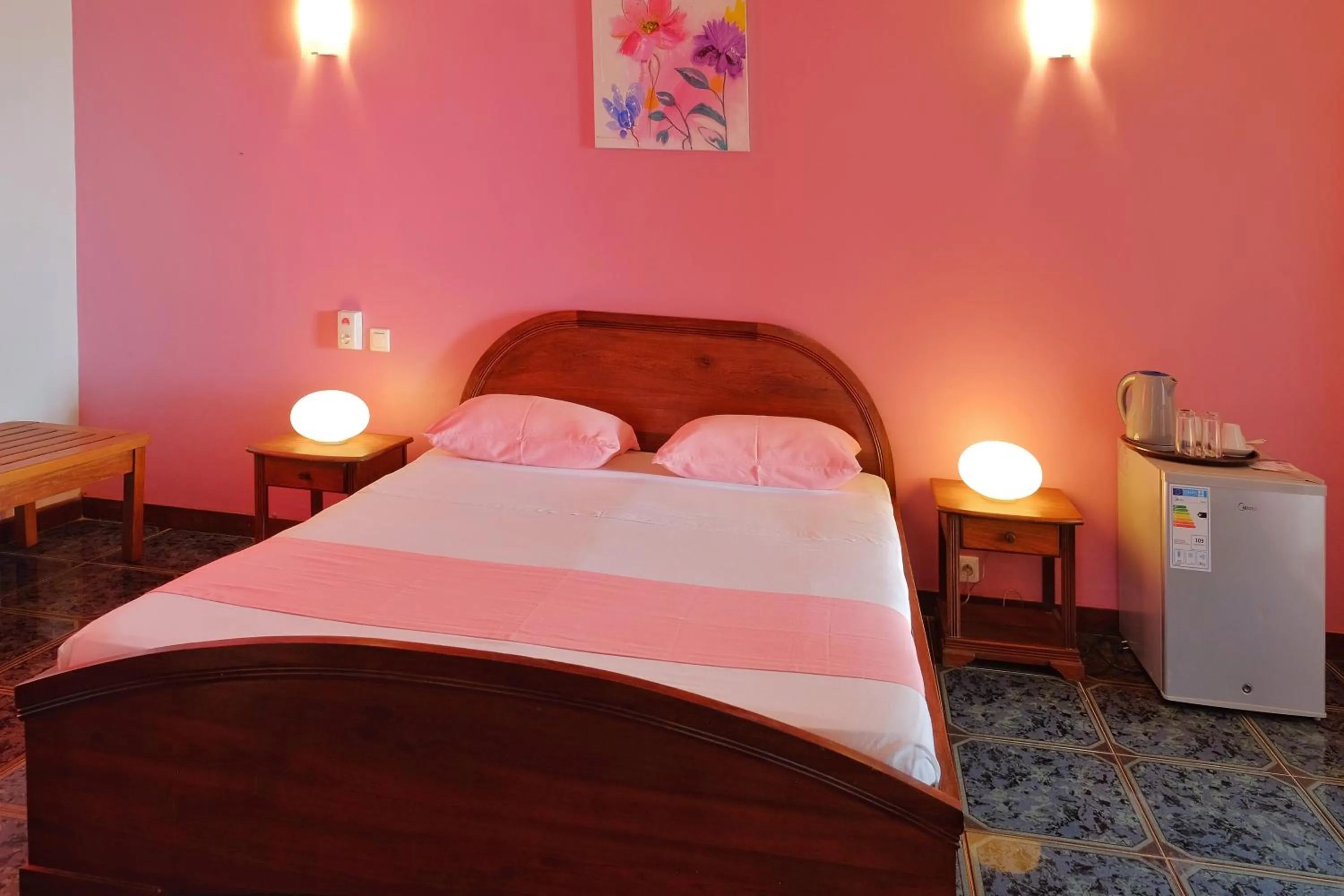 Bed in Hôtel Villa Les Orchidées