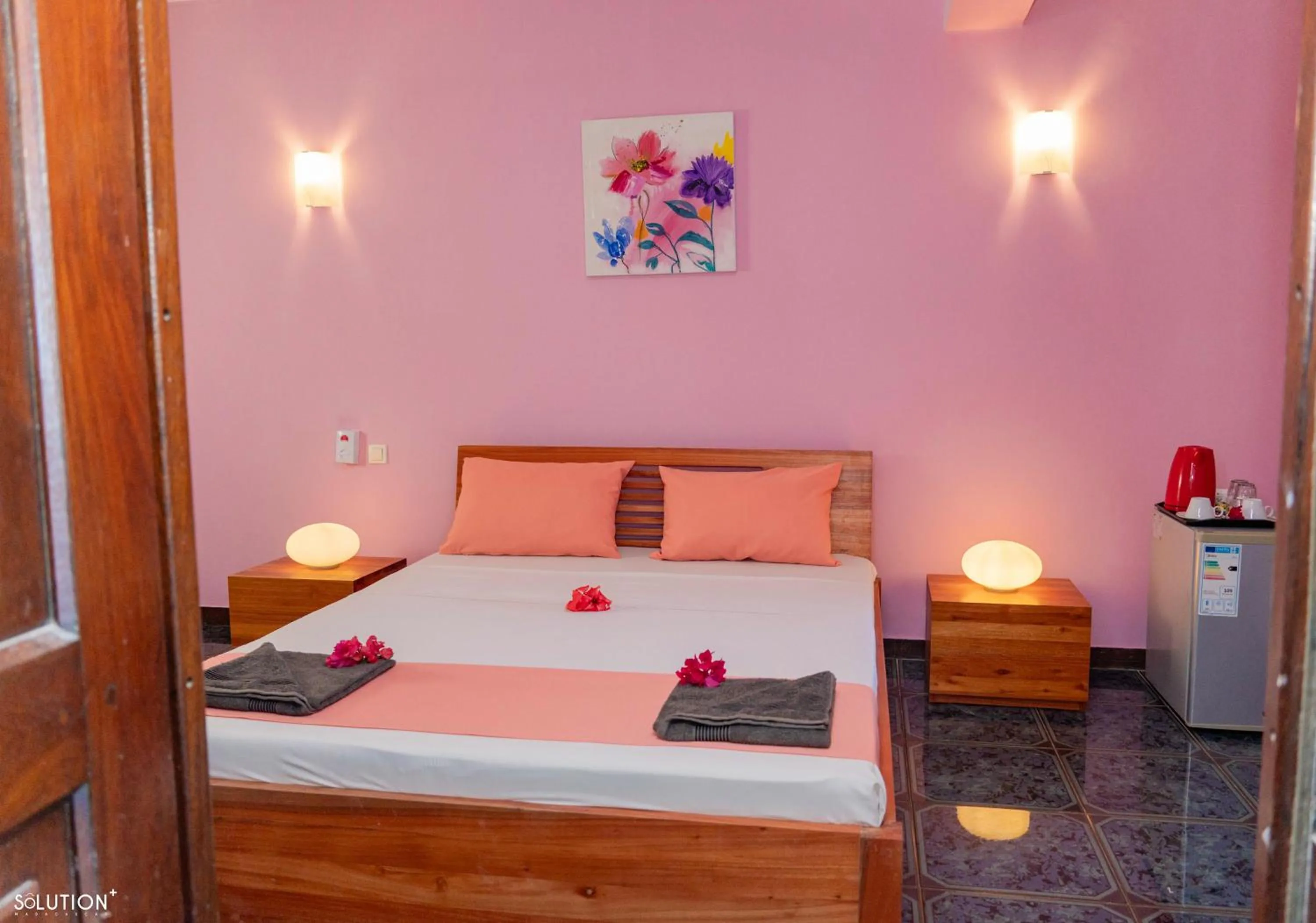 Bed in Hôtel Villa Les Orchidées