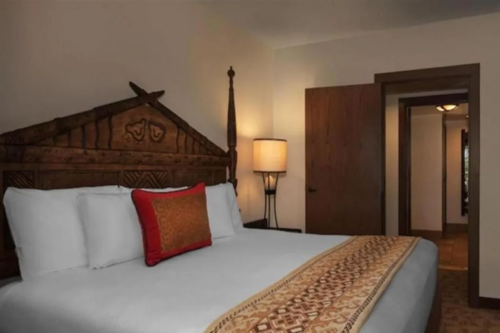 Bed in Disney's Animal Kingdom Villas - Jambo House