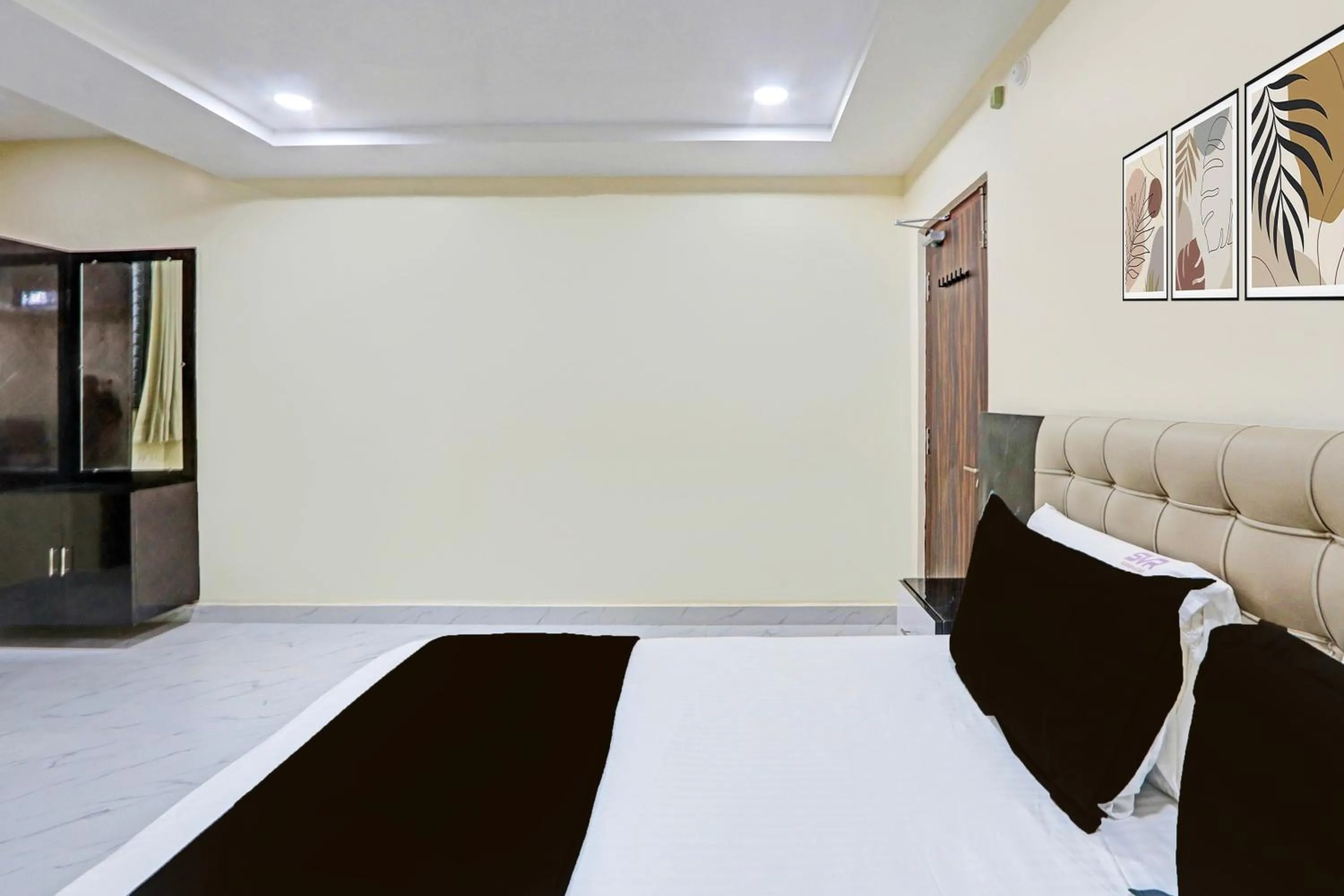 Bedroom in Super Hotel O SRI VISHNU RESIDENCY