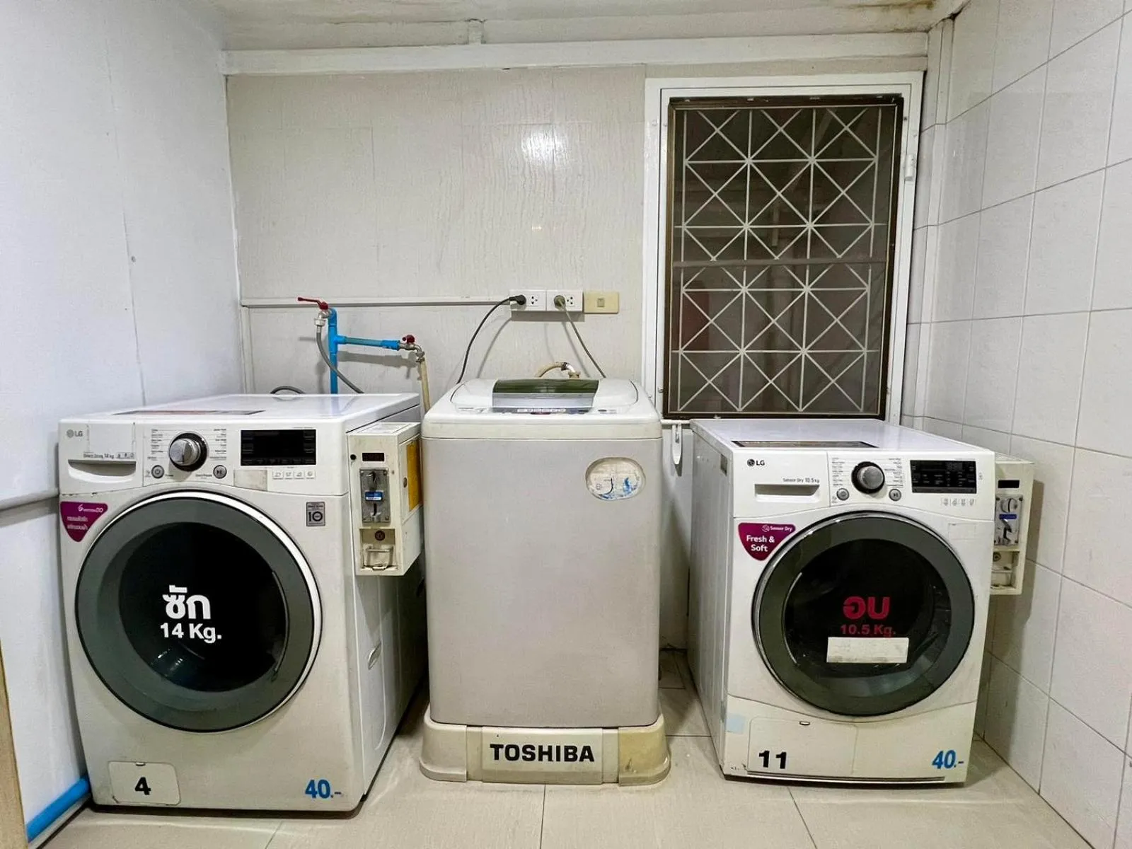 washing machine in Comfy Crib Hostel 2
