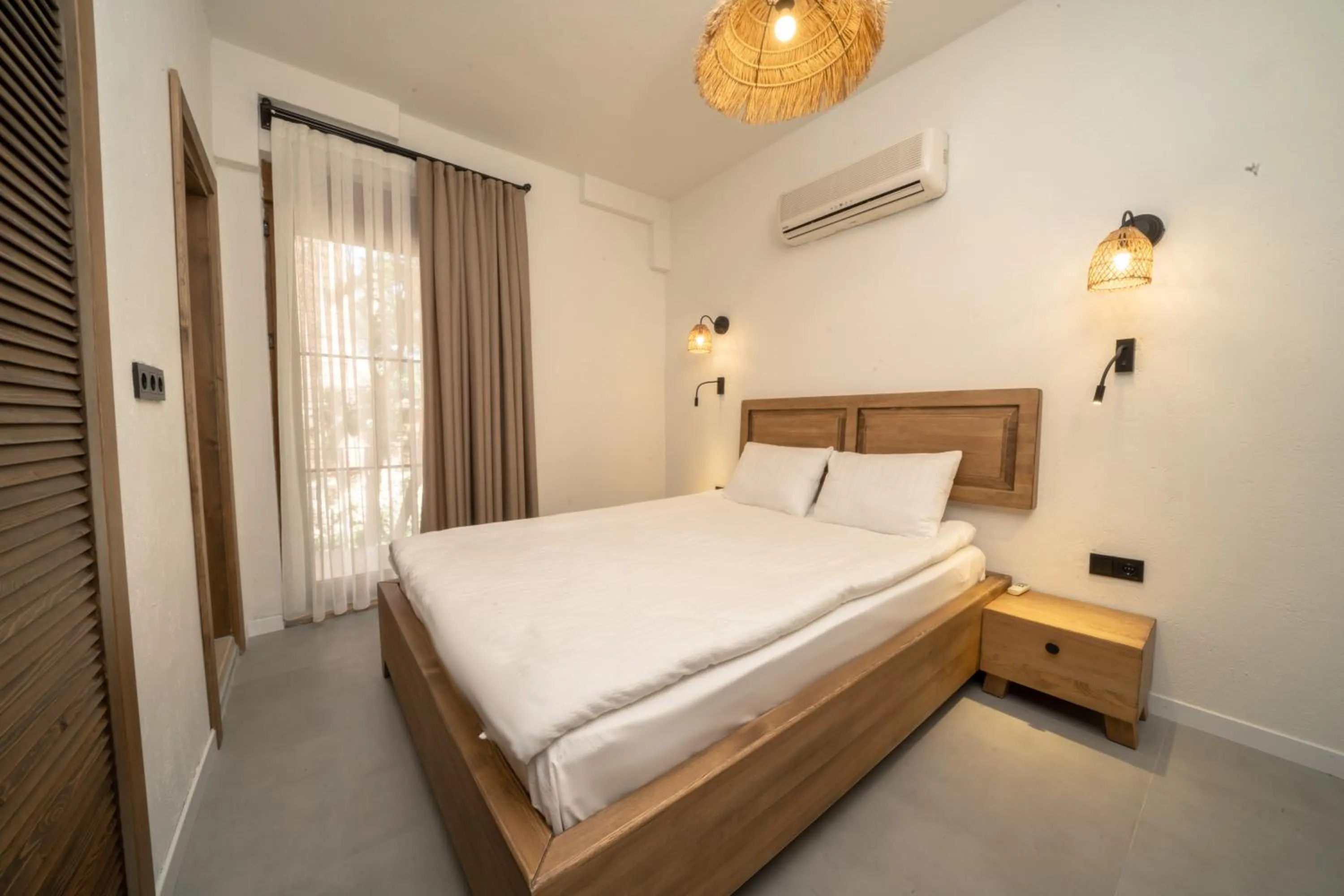 Bed in Zümrüt Çıralı Boutique Hotel