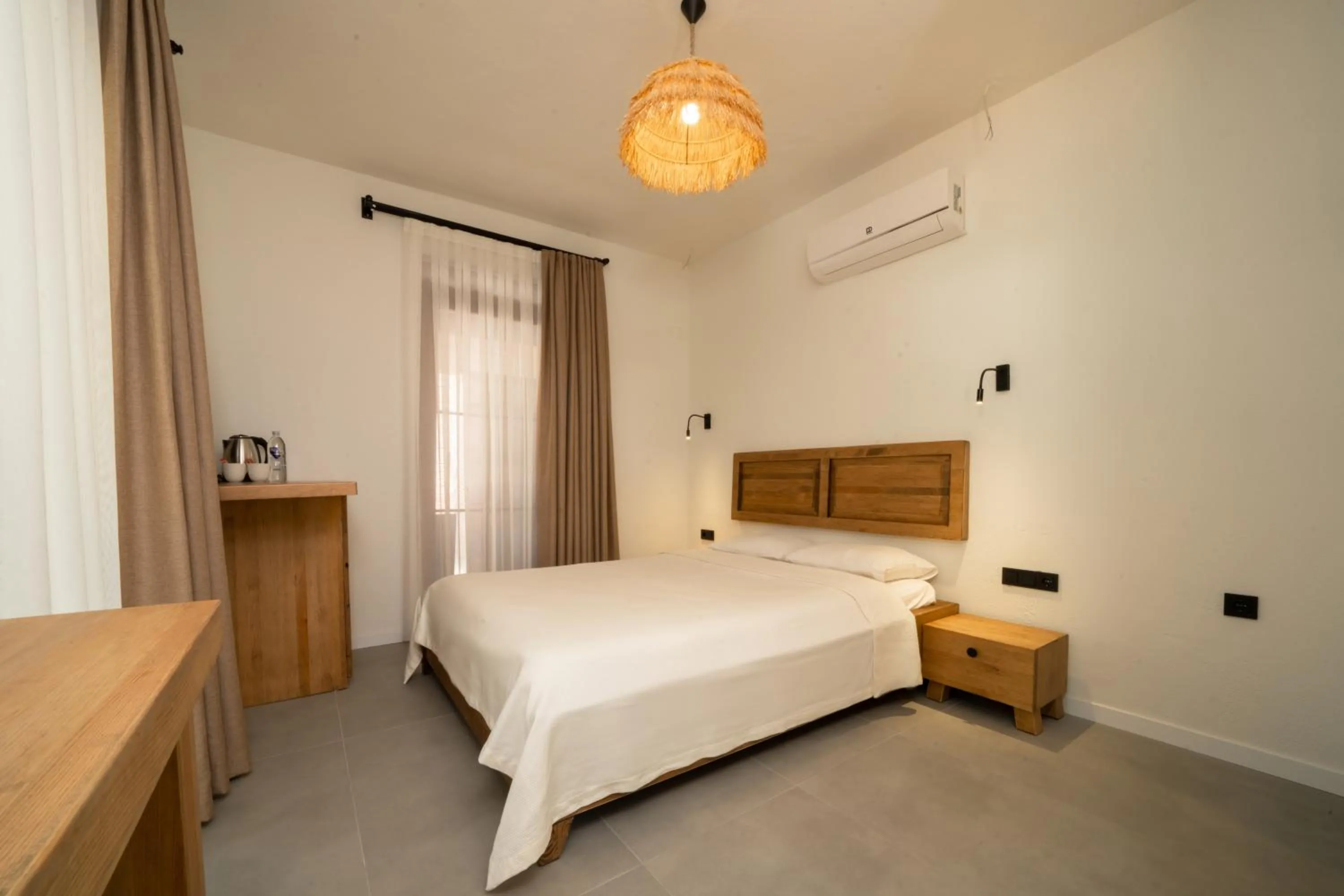 Bed in Zümrüt Çıralı Boutique Hotel