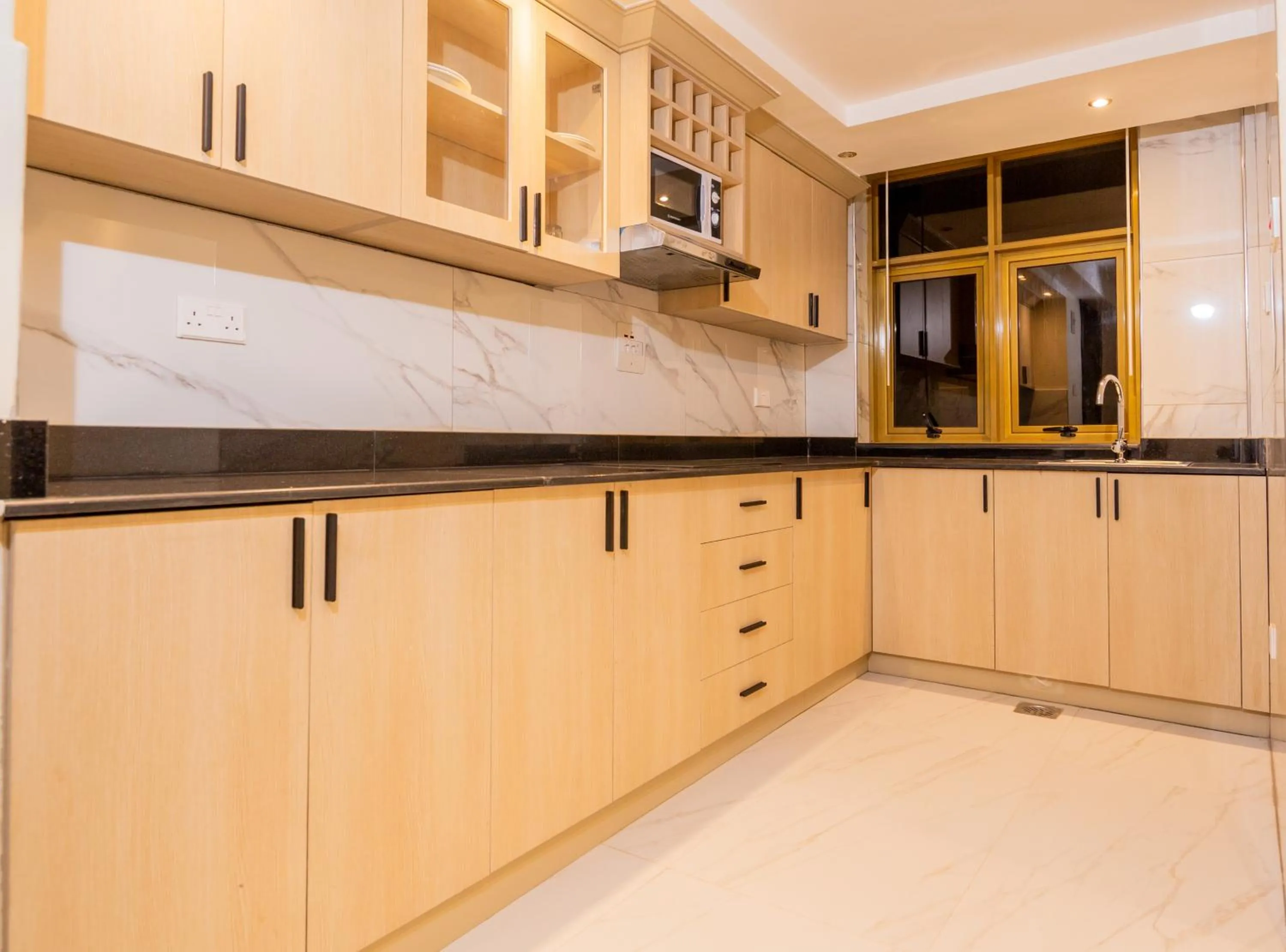 Kitchen or kitchenette in The Grandville Manor Hotel