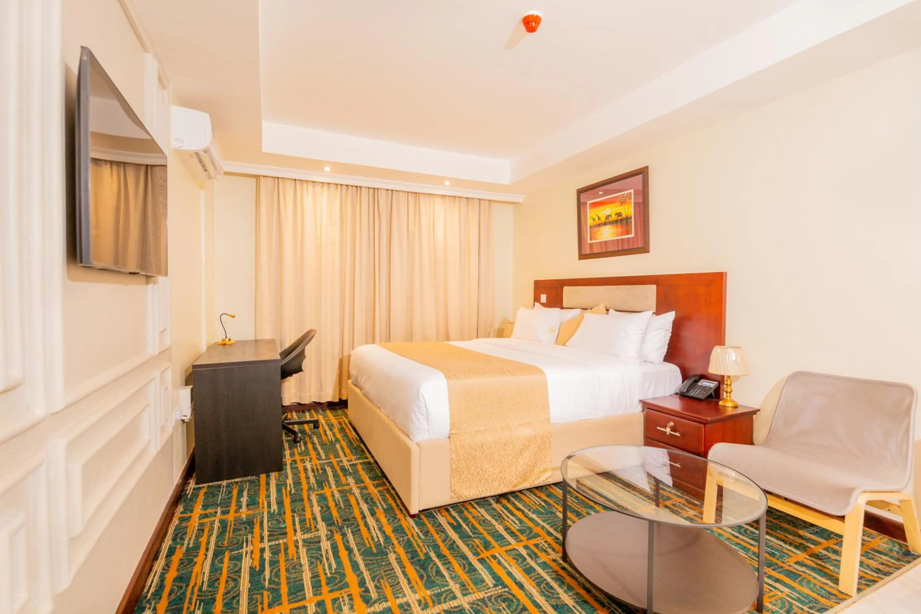 Bed in The Grandville Manor Hotel
