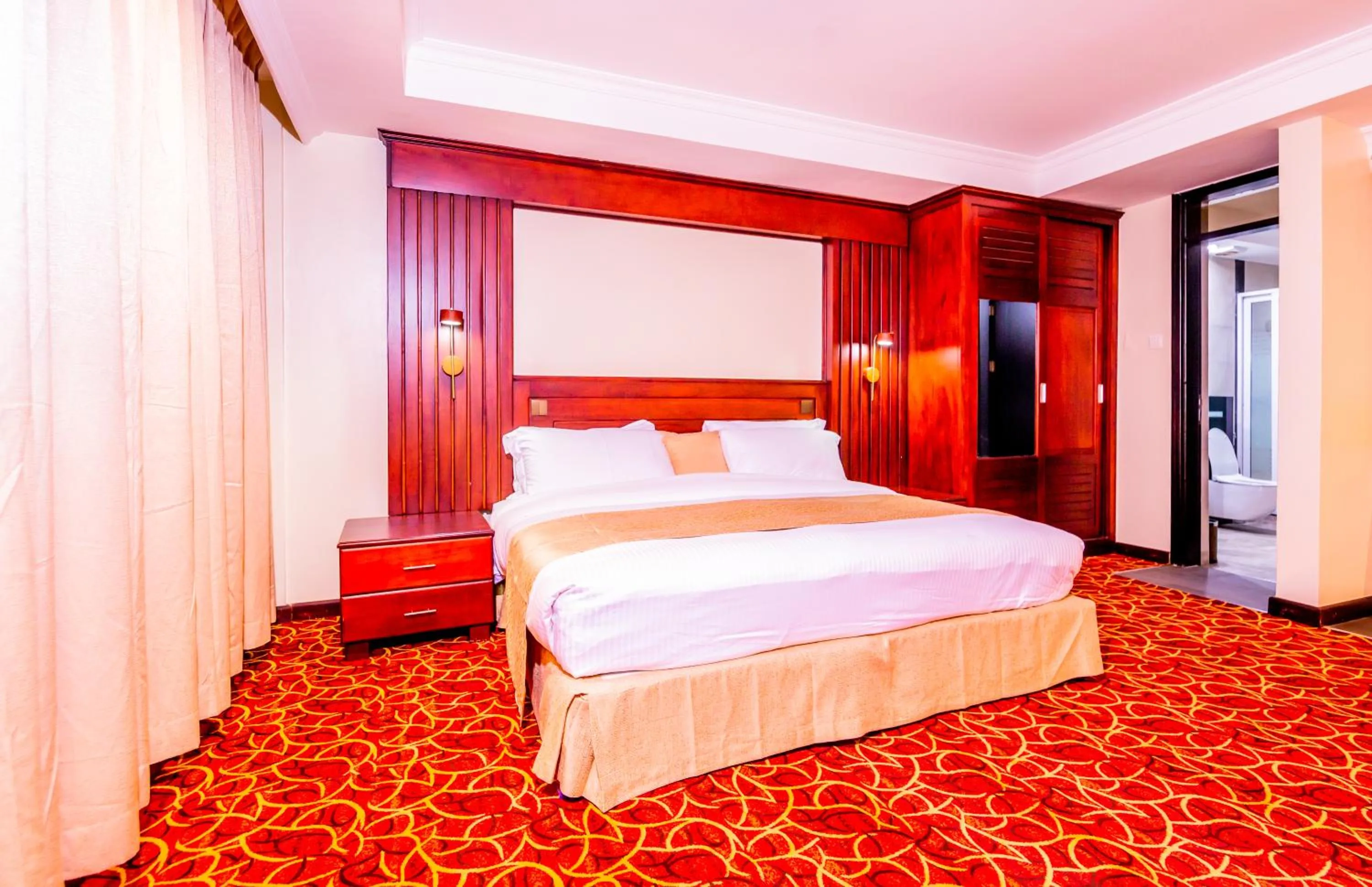 Bed in The Grandville Manor Hotel