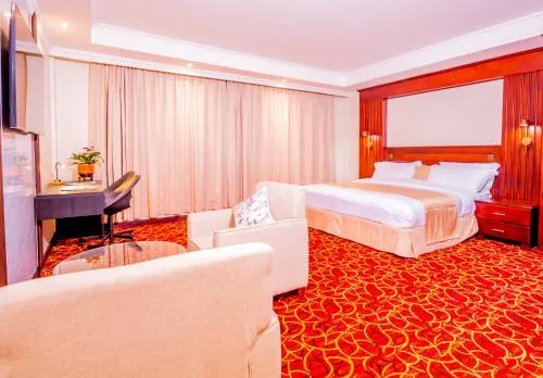 Bed in The Grandville Manor Hotel