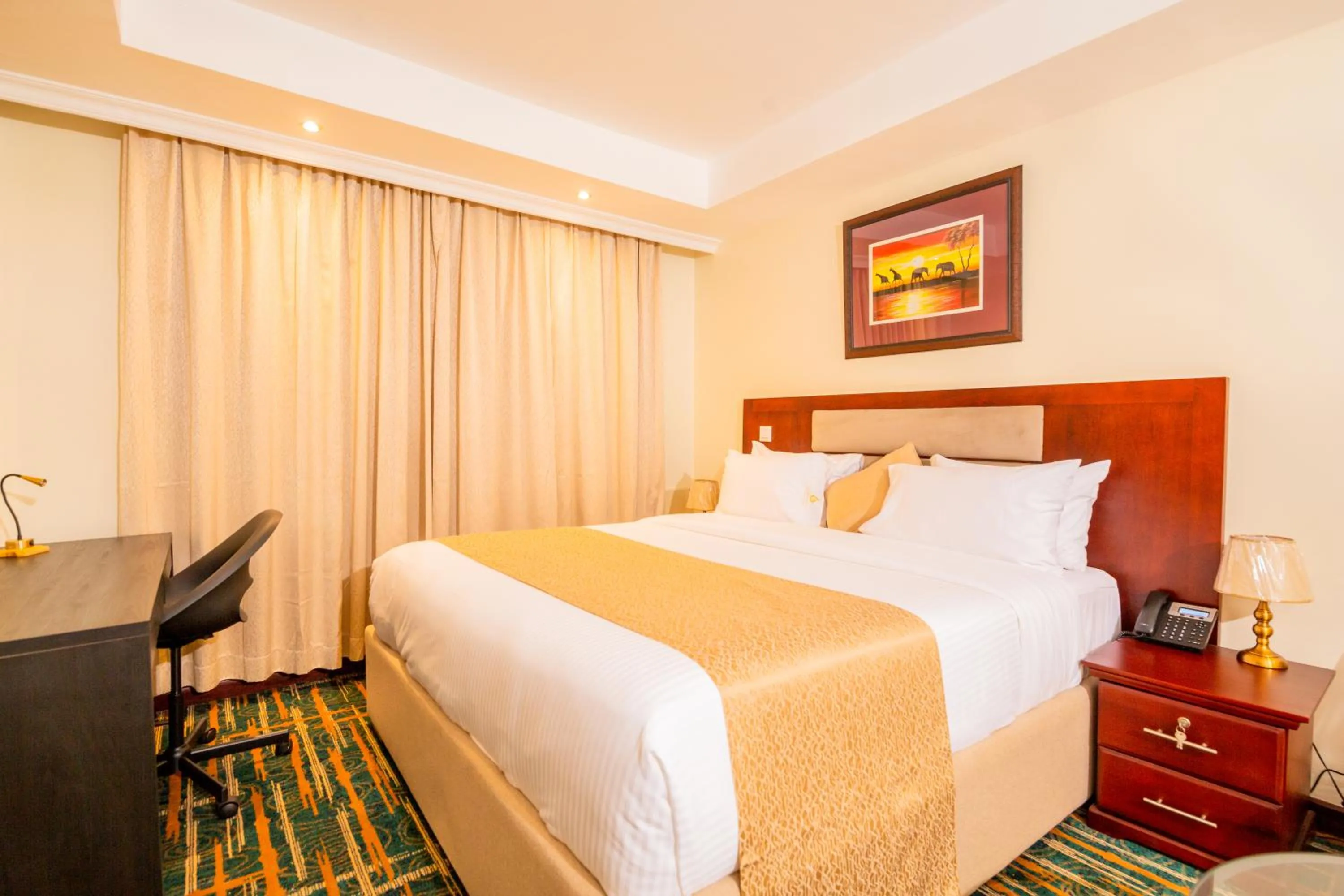 Bed in The Grandville Manor Hotel