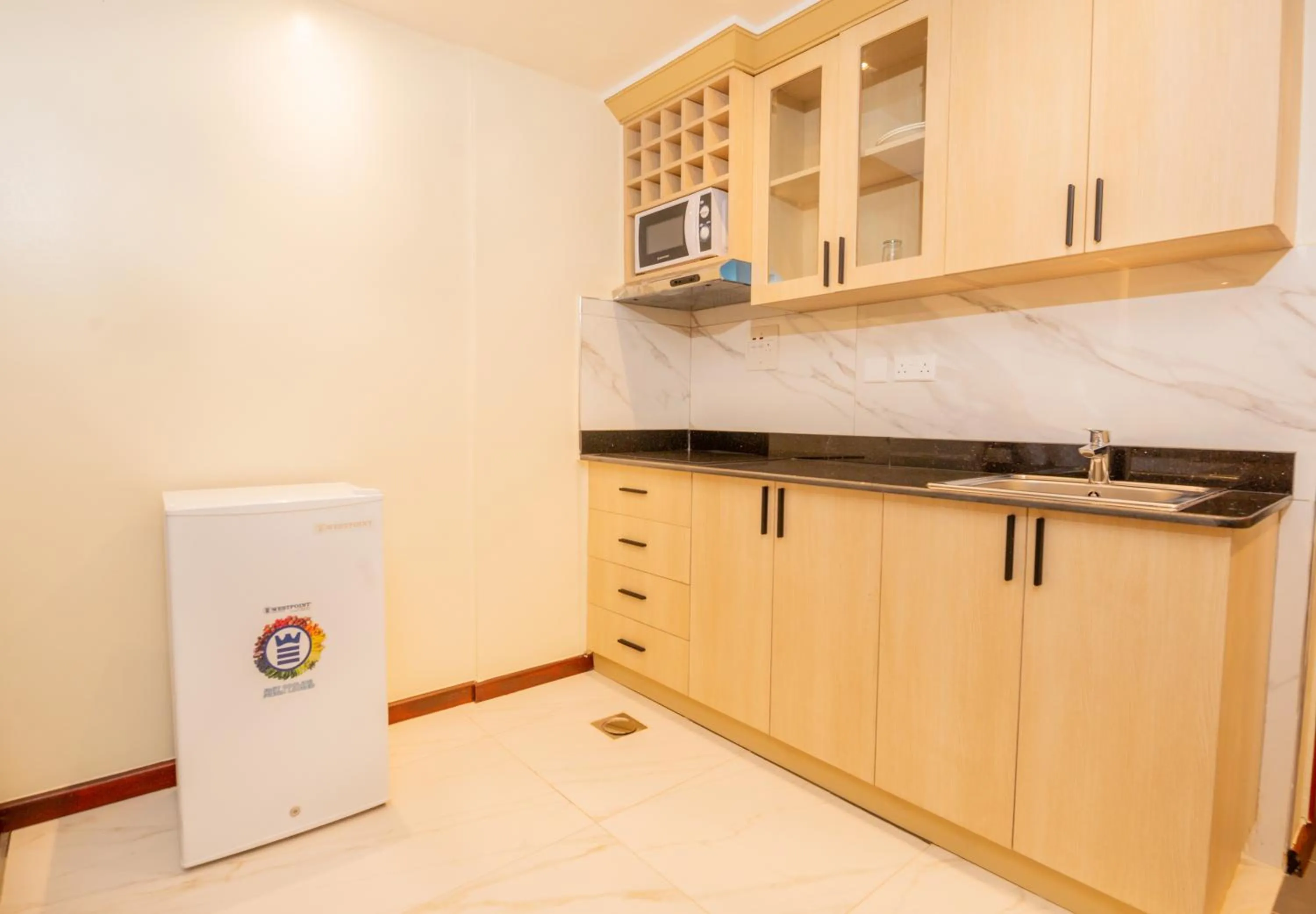 Kitchen or kitchenette in The Grandville Manor Hotel