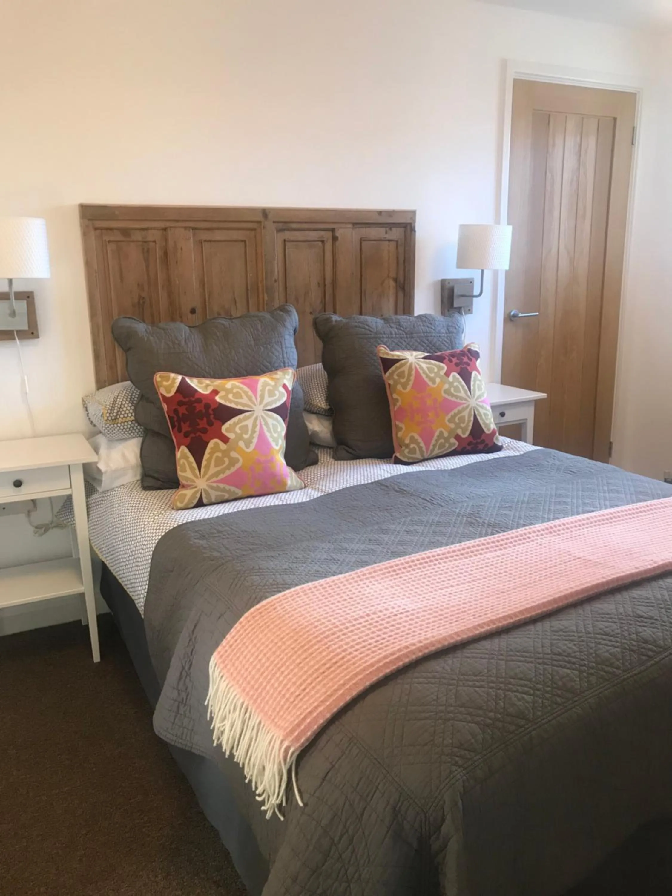 Bed in The Gallery Two Bedroom Apartment