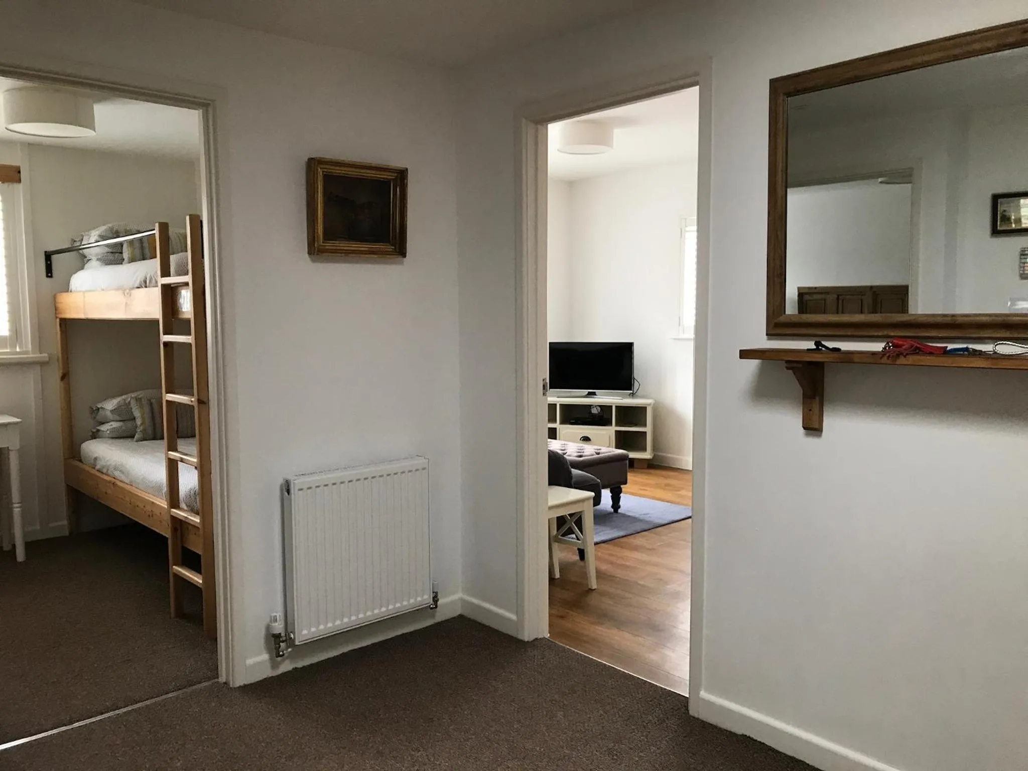 Bed in The Gallery Two Bedroom Apartment
