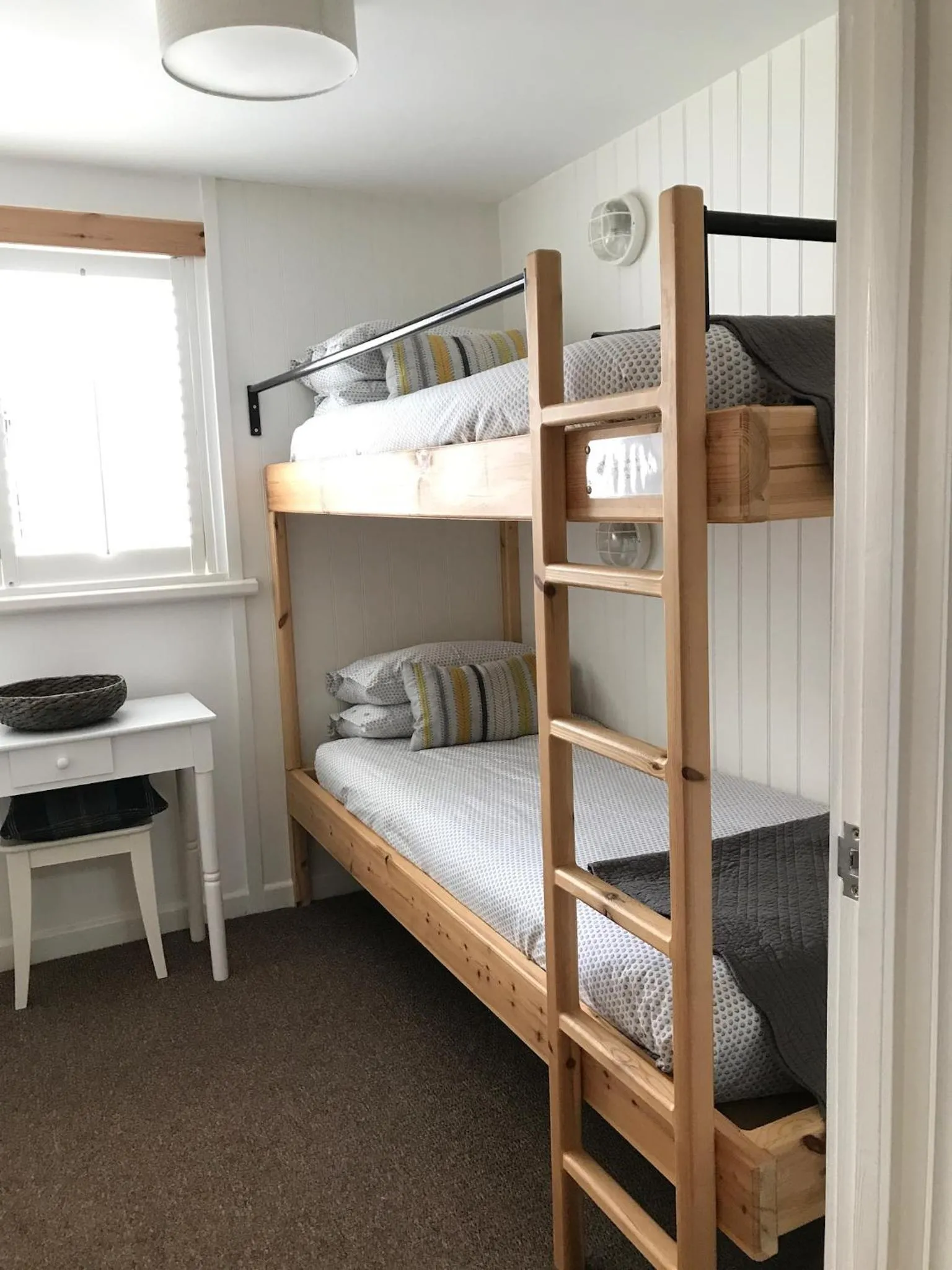 Bed in The Gallery Two Bedroom Apartment