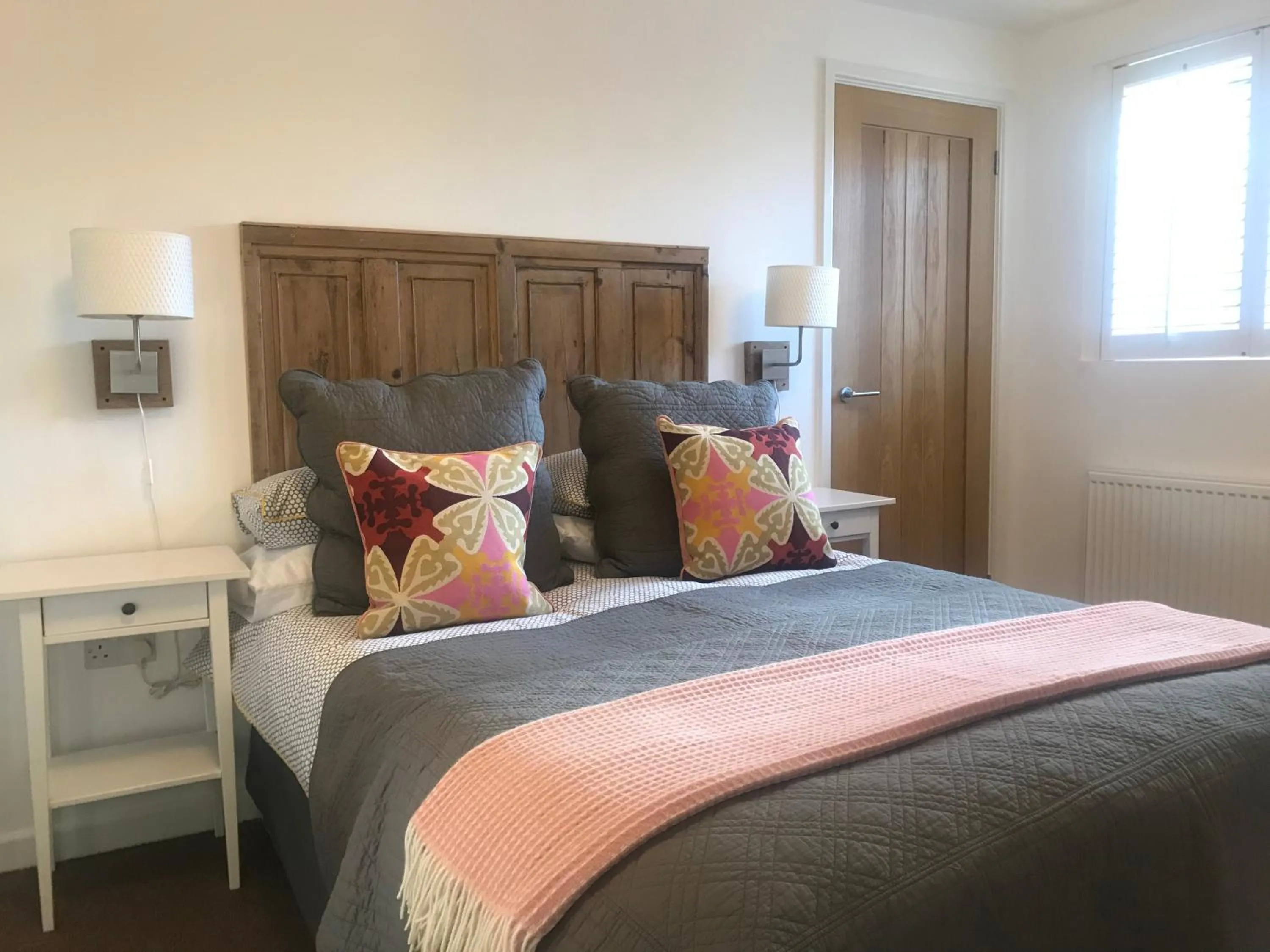 Bed in The Gallery Two Bedroom Apartment