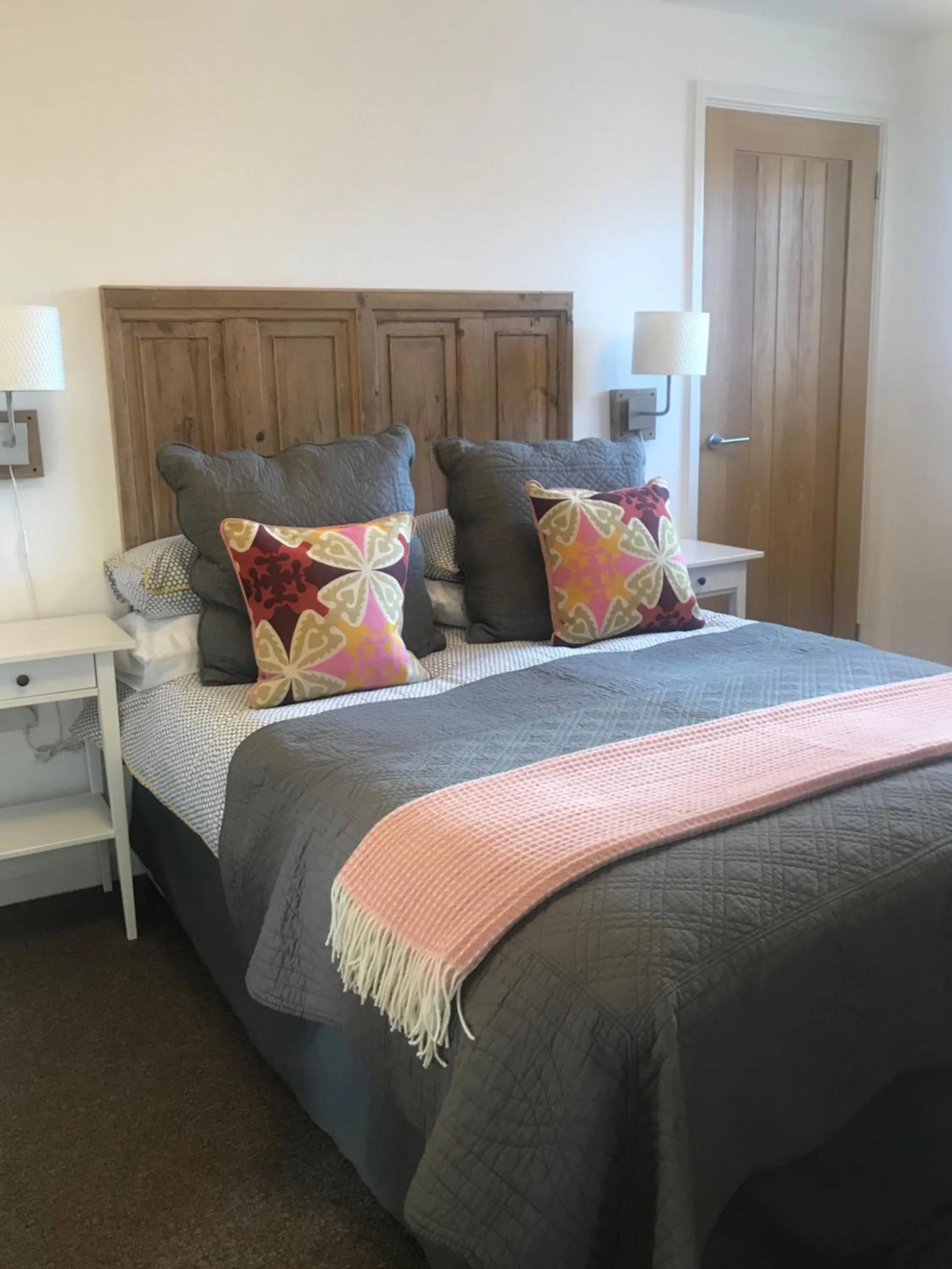 Bed in The Gallery Two Bedroom Apartment