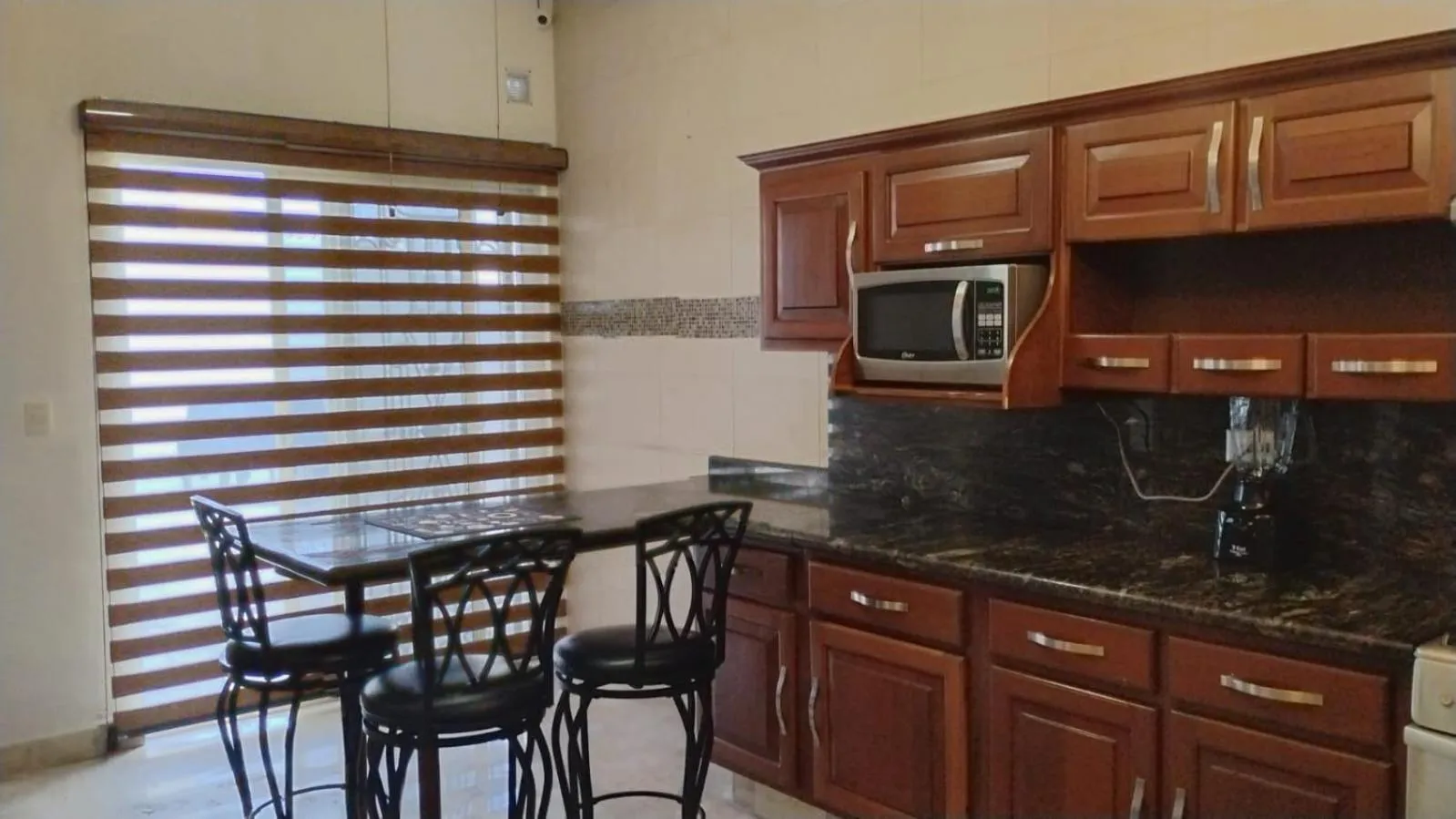 Communal kitchen in Cumbresuites