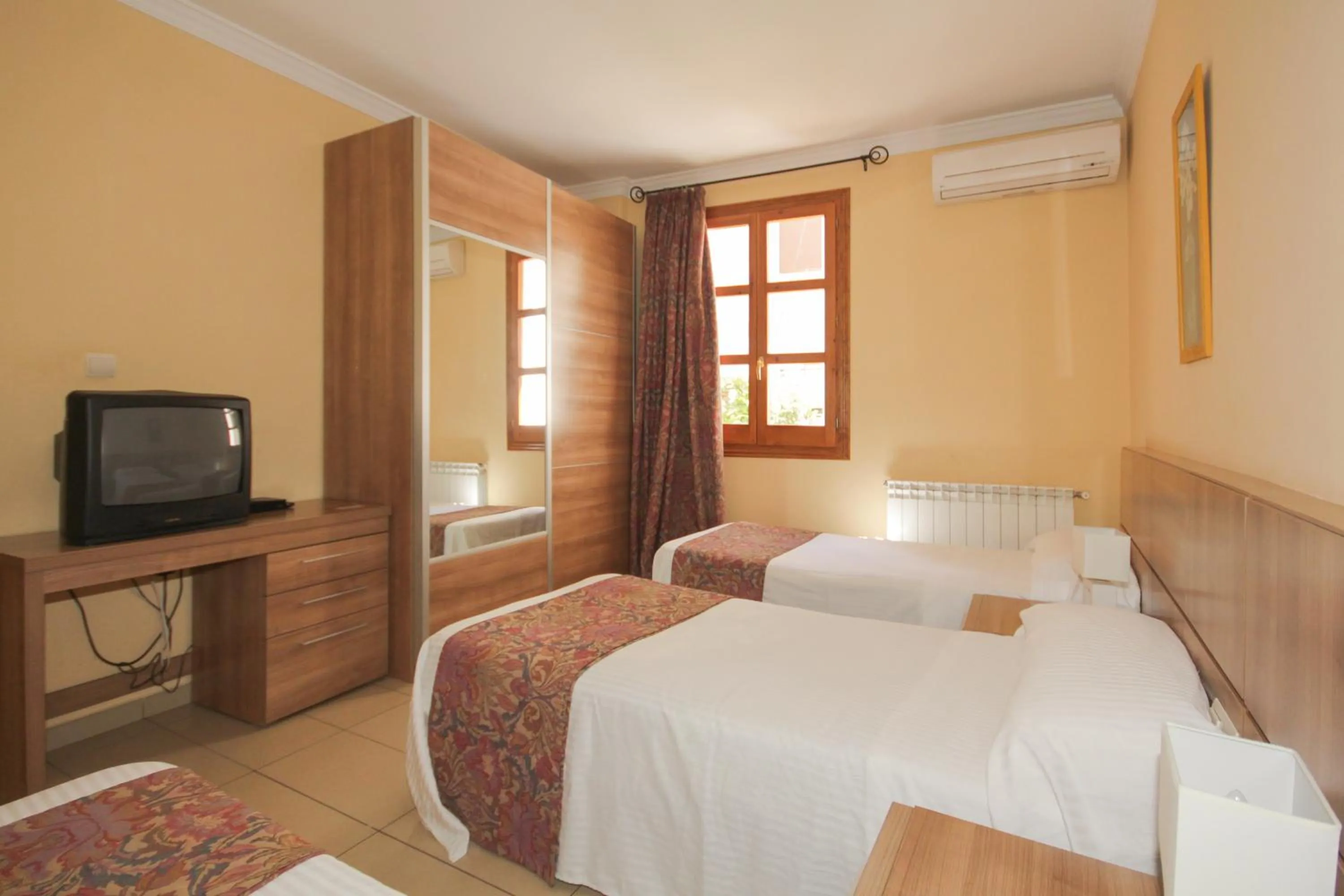 Photo of the whole room, Bed in Hostal Costa Azul