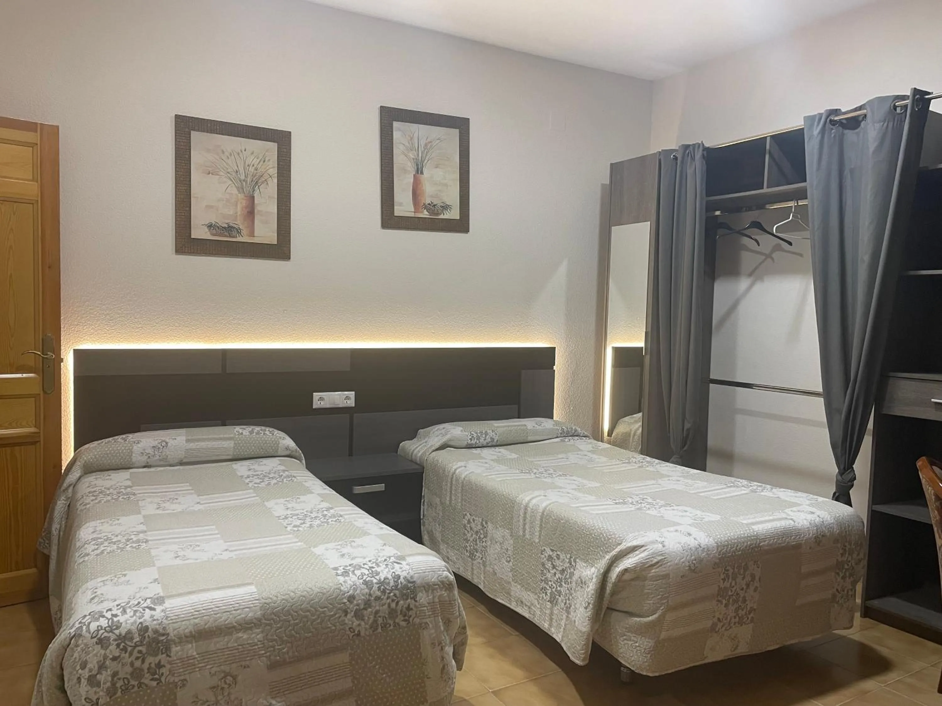 Photo of the whole room, Bed in Hostal Costa Azul