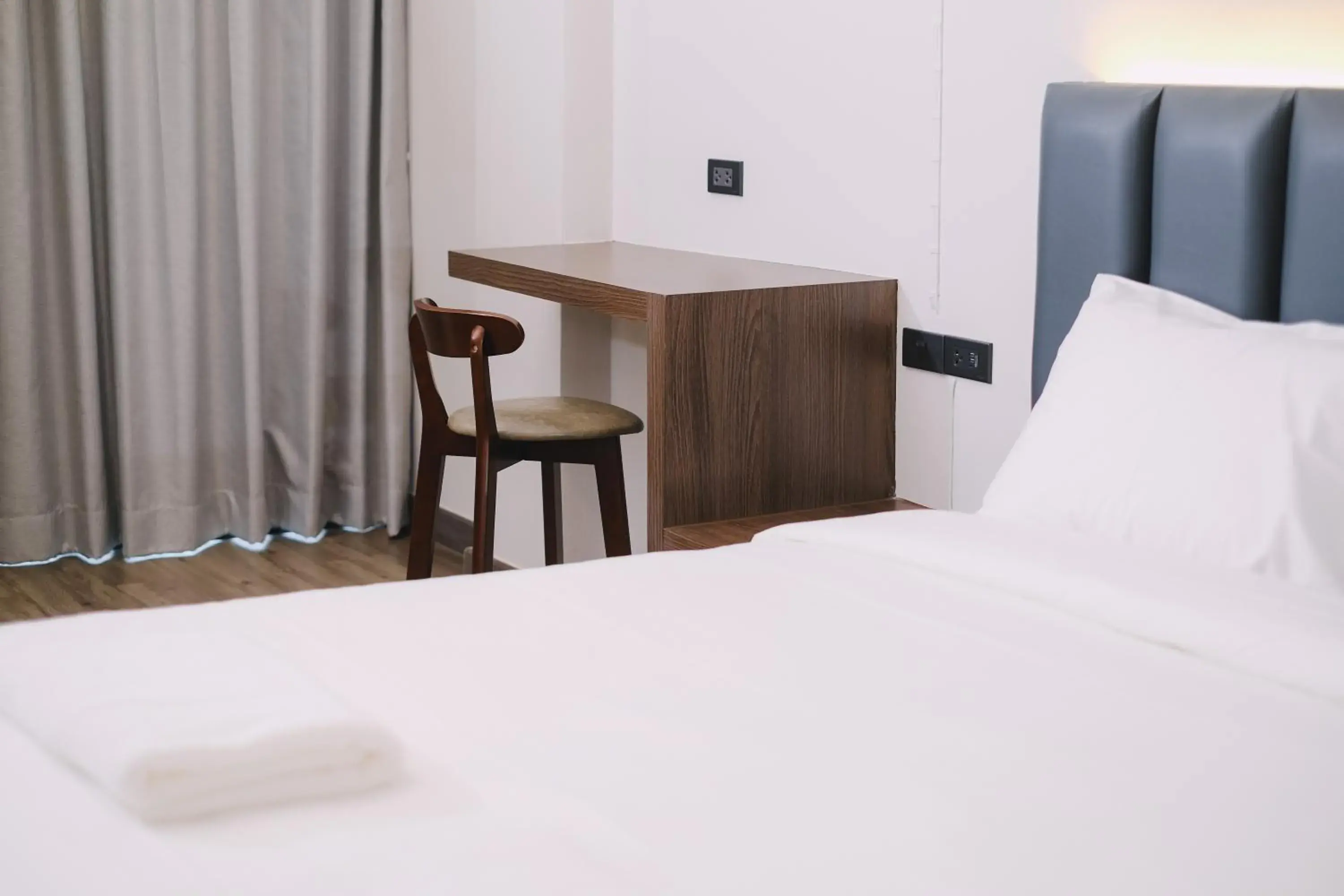 Seating area, Bed in Raya Hotel Krabi Seating area, Bed in Raya Hotel Krabi