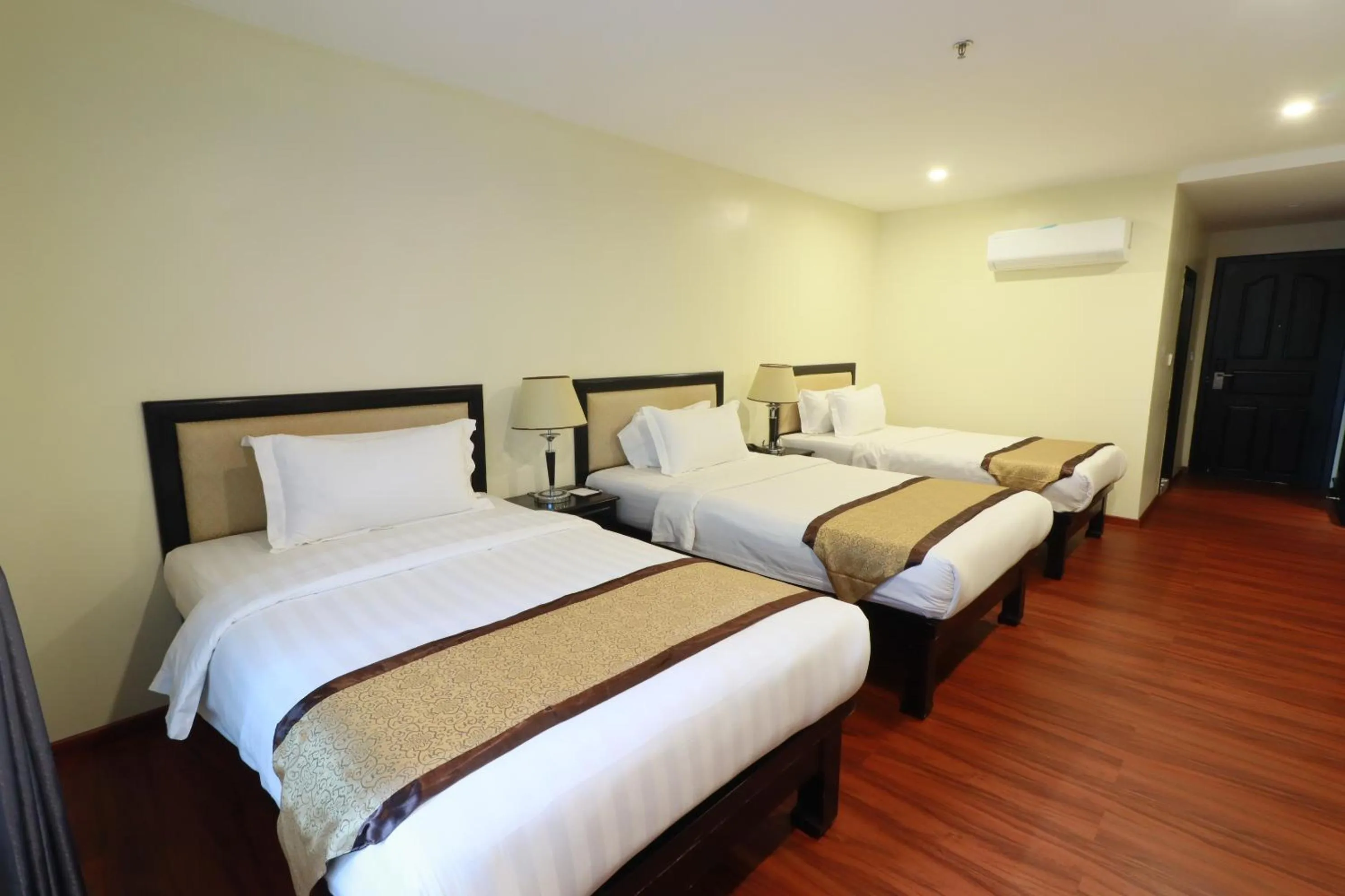 Bed in Mahasakor Inn