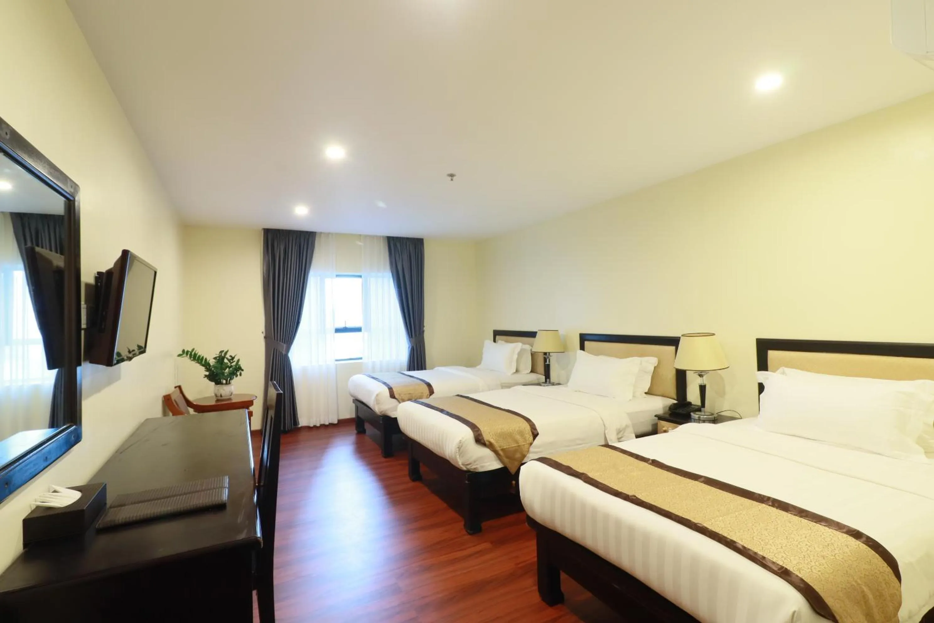 Bed in Mahasakor Inn