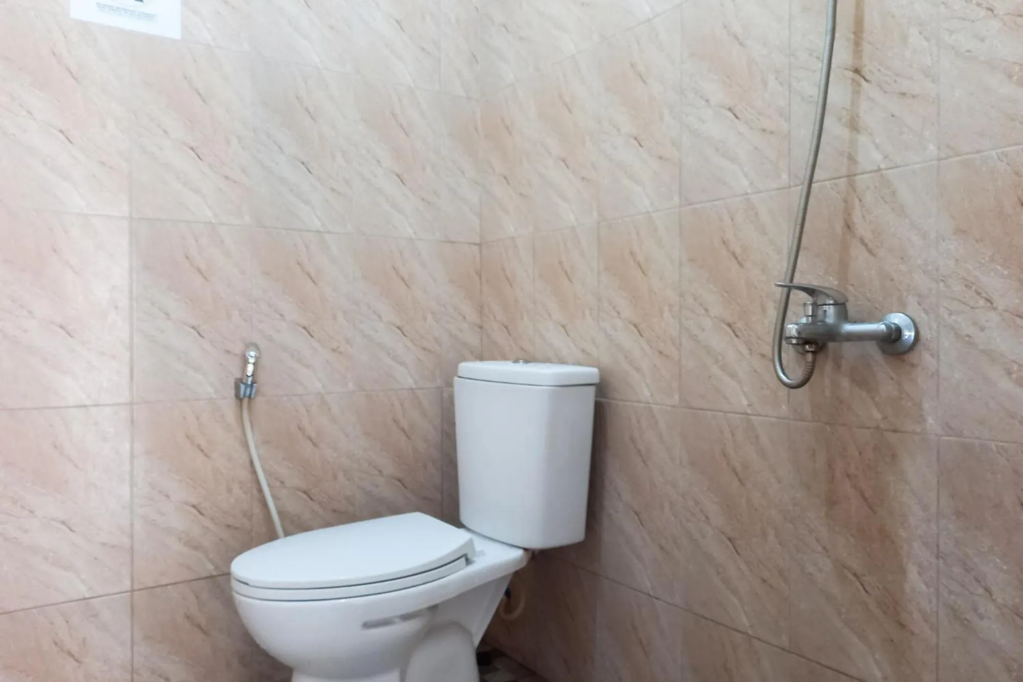 Bathroom in RedDoorz Syariah at Penginapan Queen Sungai Penuh