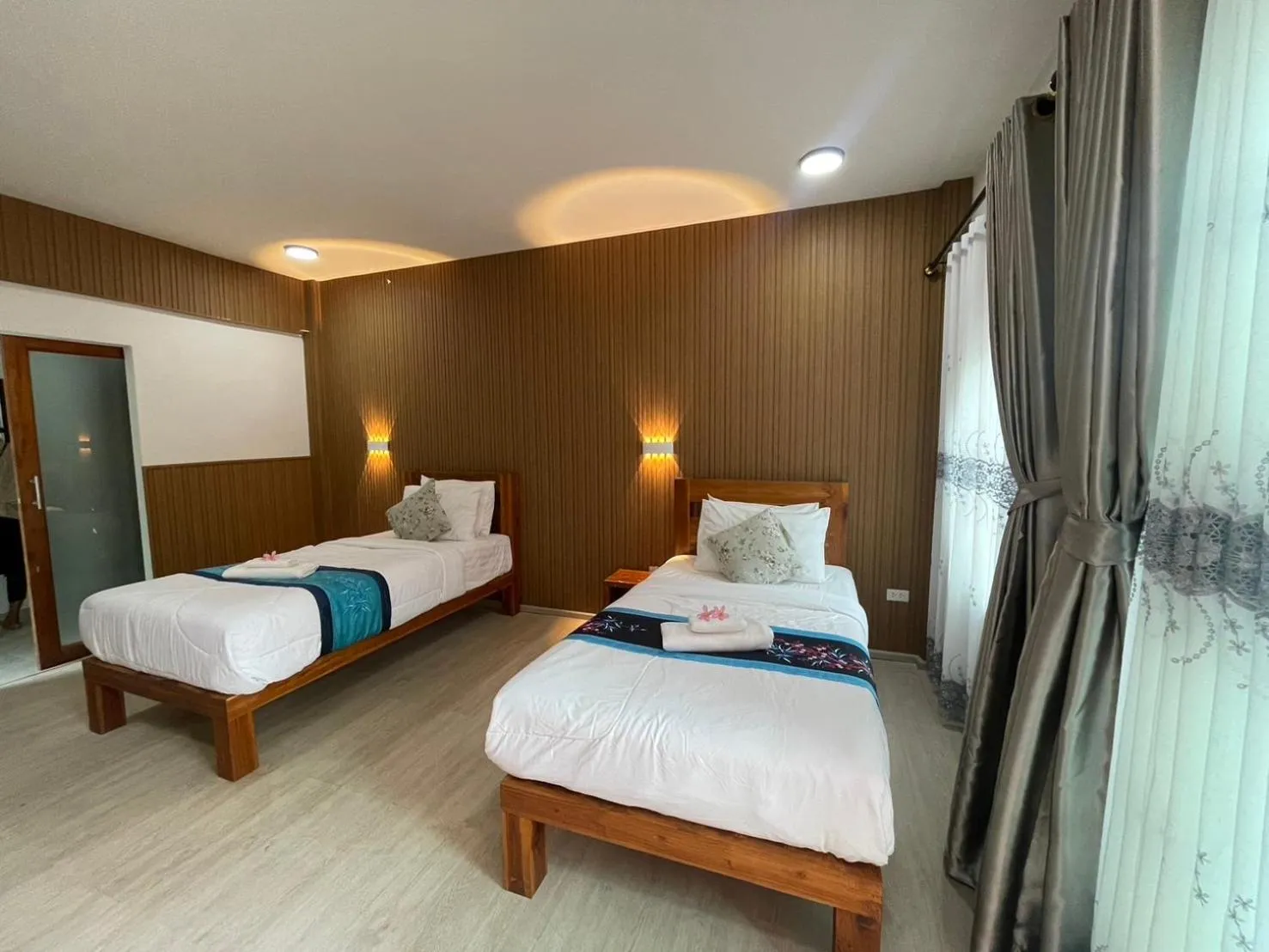 Photo of the whole room, Bed in Andaman Beach Resort by Zodiac