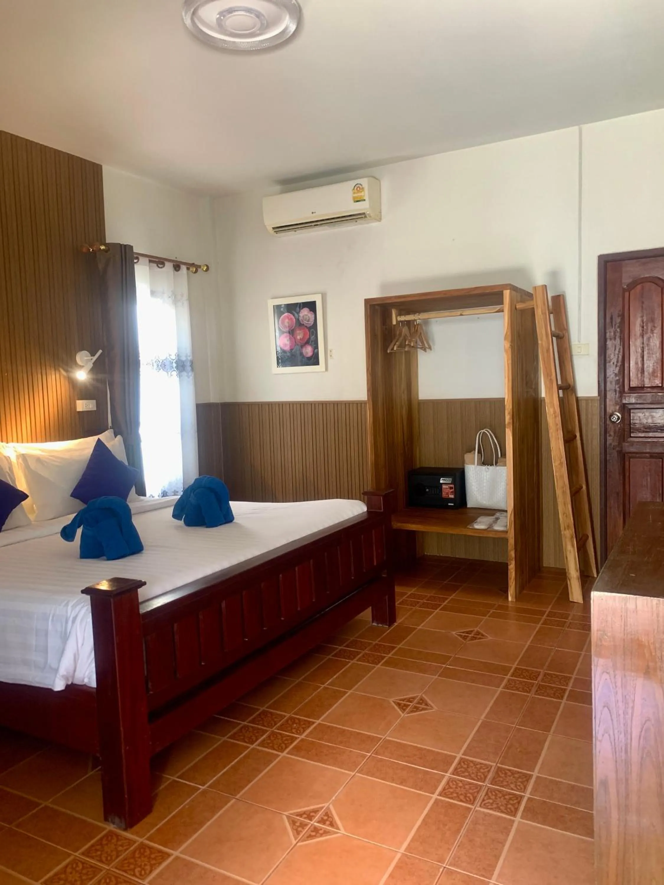 Bed in Andaman Beach Resort by Zodiac