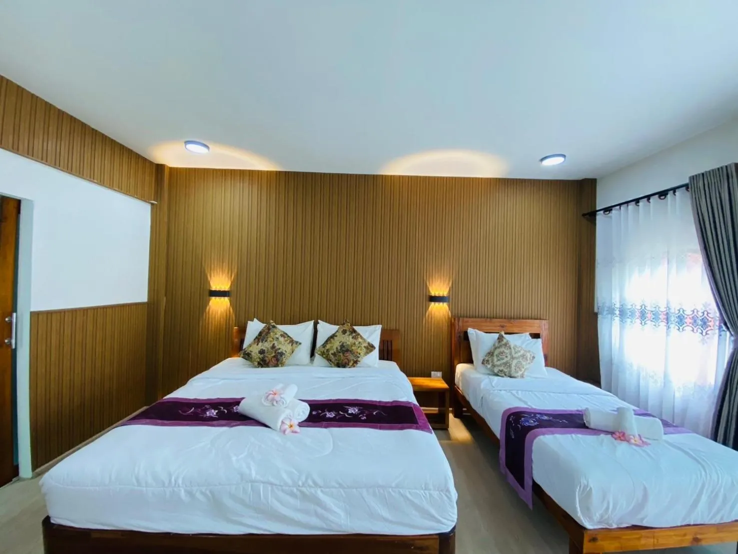 Bed in Andaman Beach Resort by Zodiac