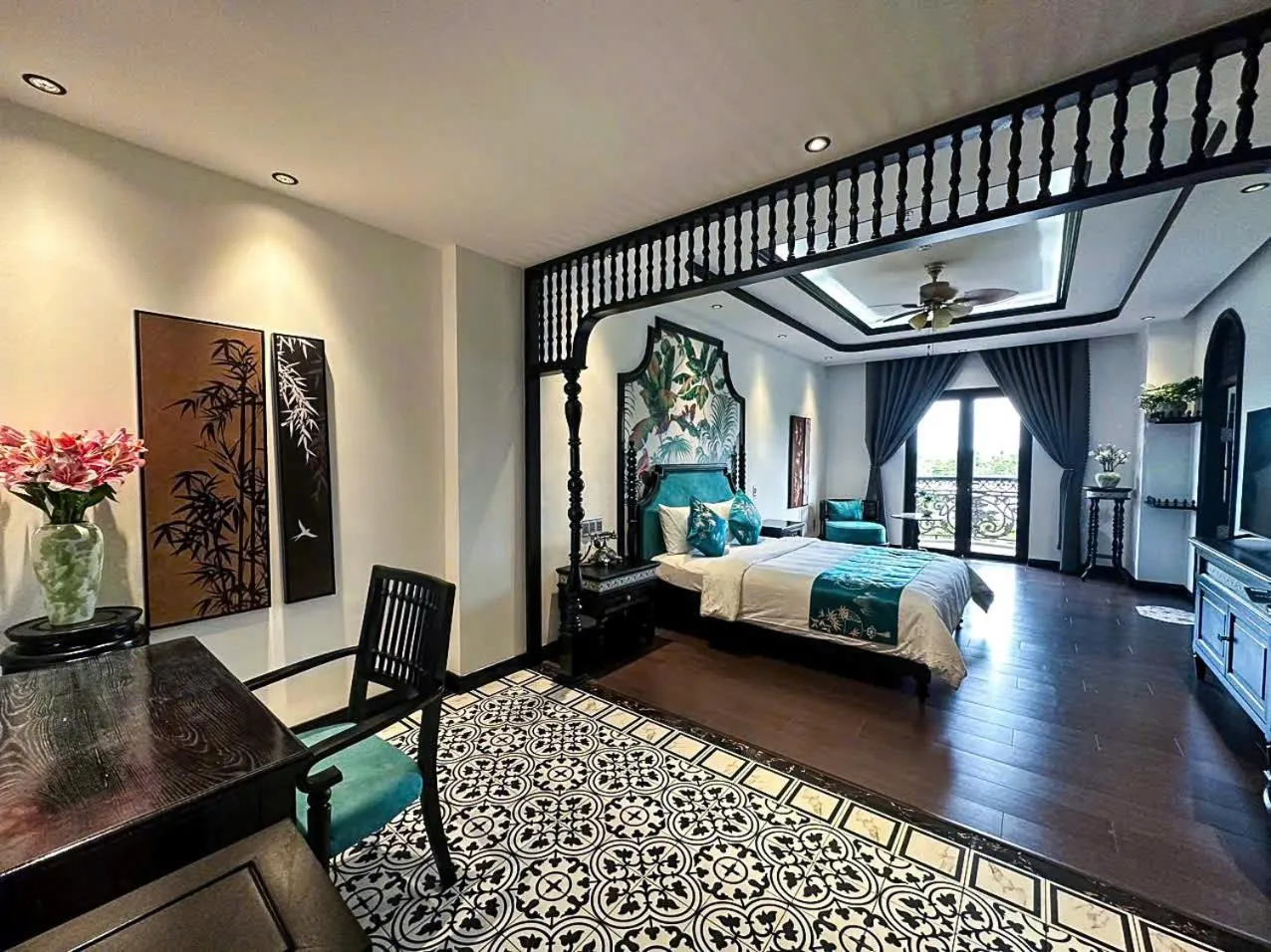 Bed in MAISON CAMELLIA Hotel