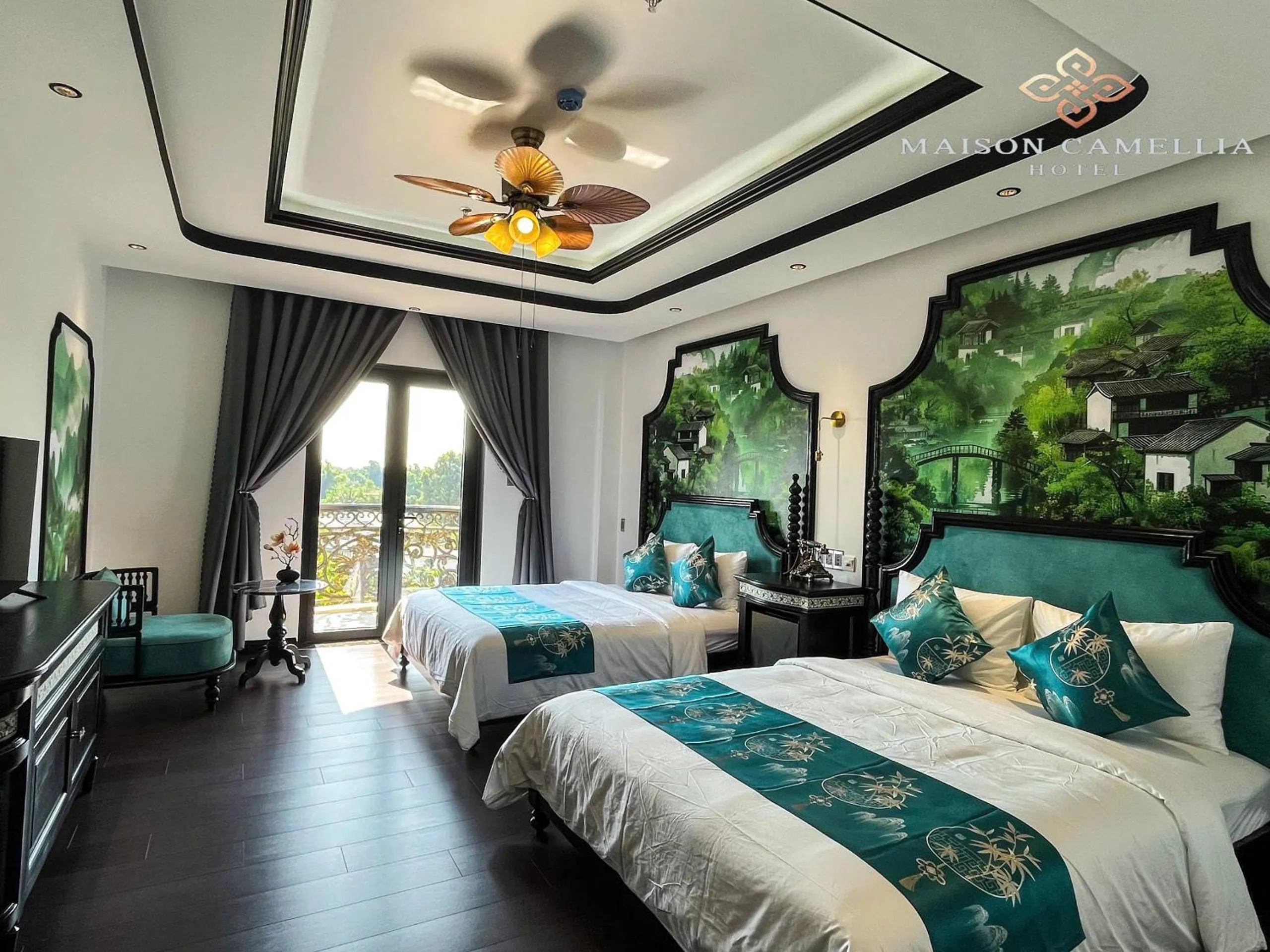 Bed in MAISON CAMELLIA Hotel