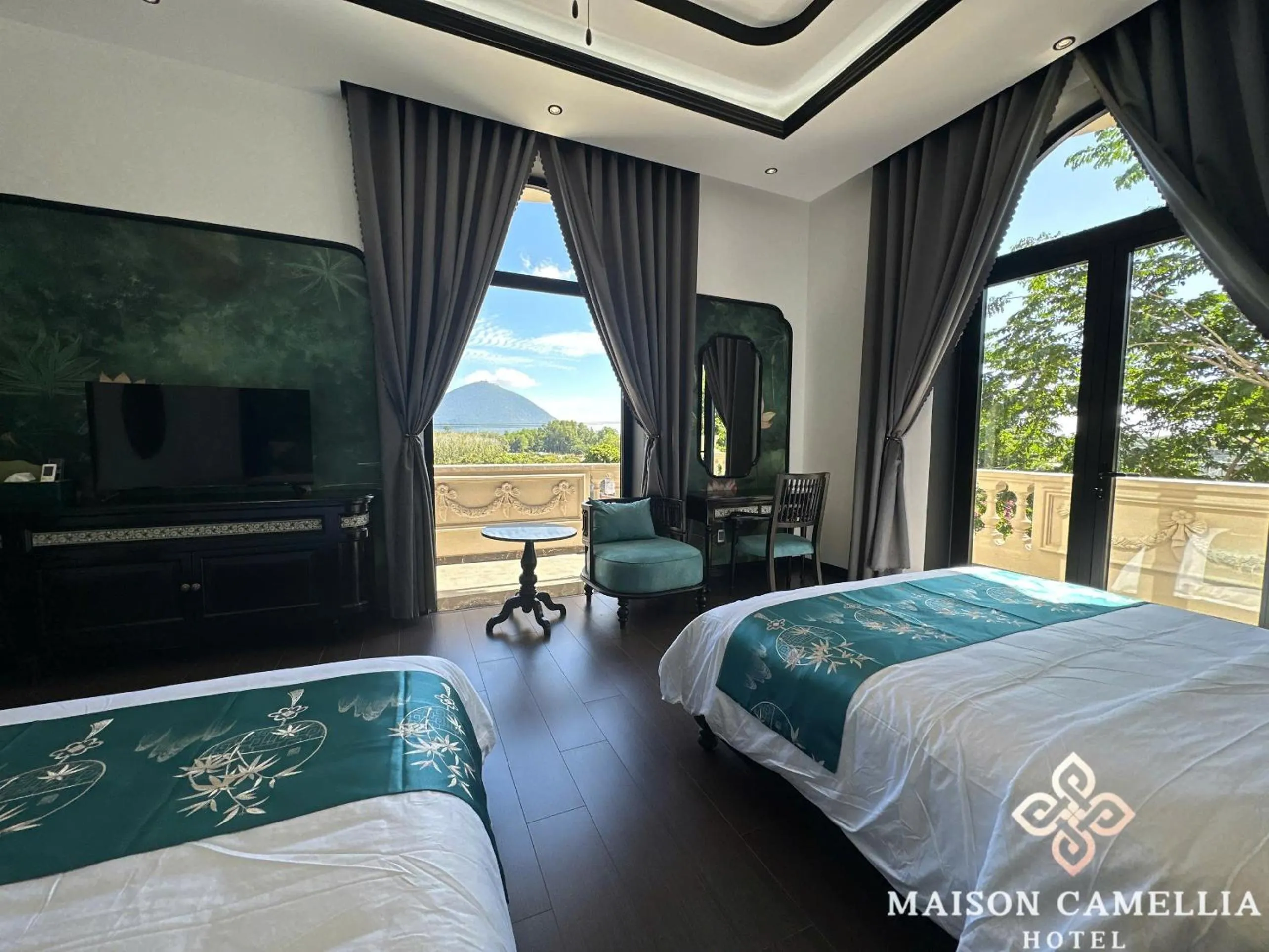 Bed in MAISON CAMELLIA Hotel