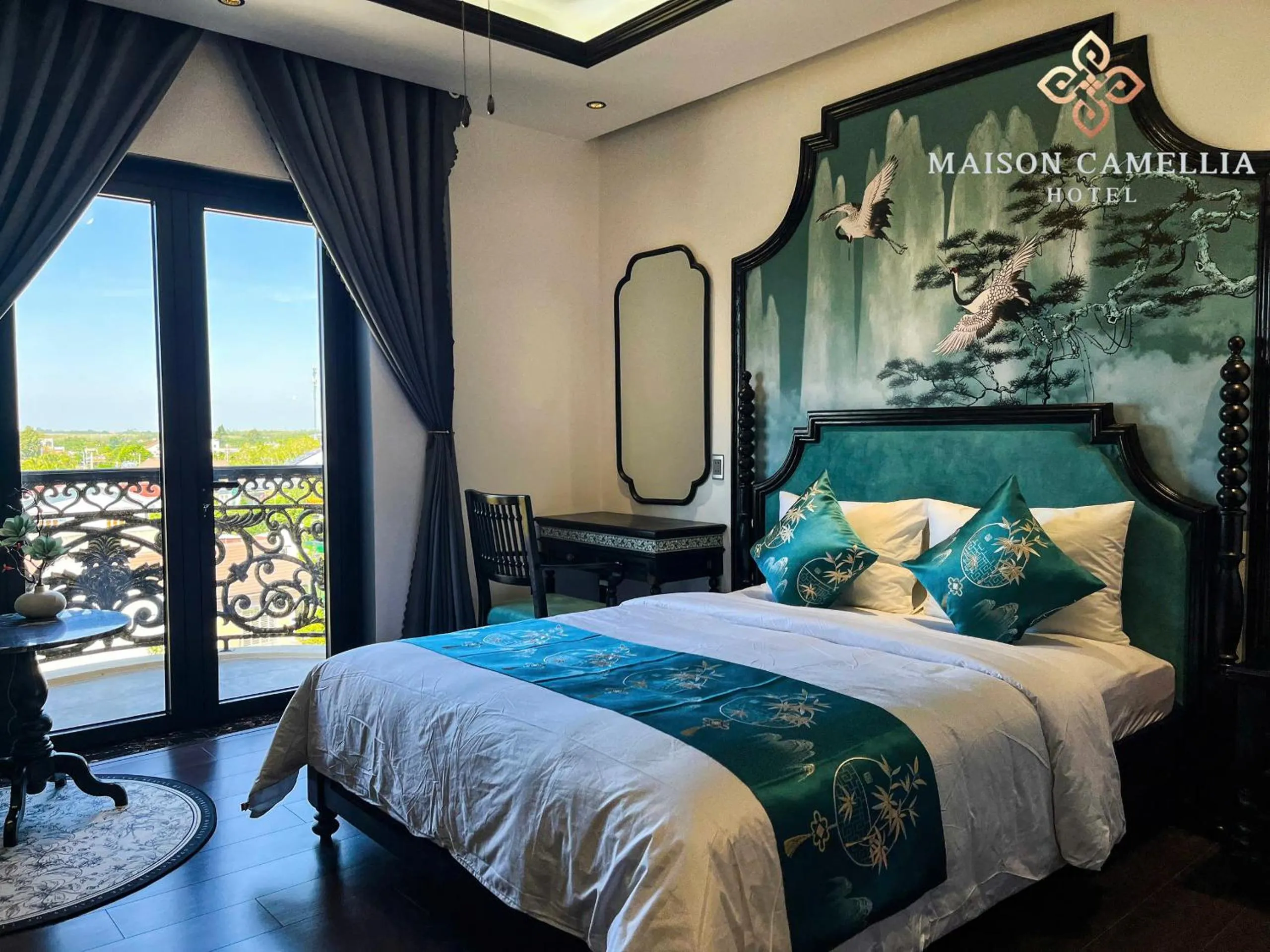 Bed in MAISON CAMELLIA Hotel