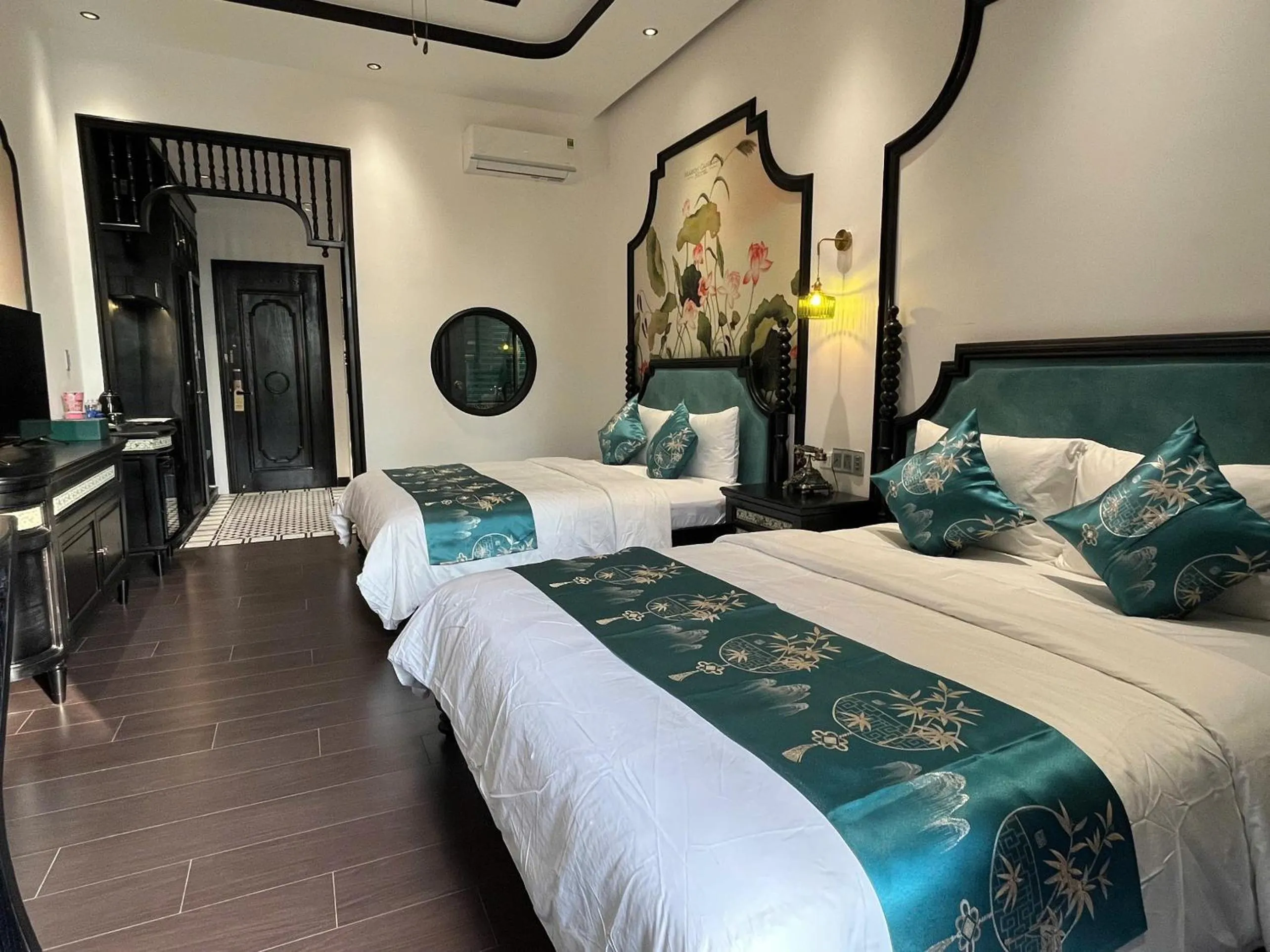 Bed in MAISON CAMELLIA Hotel