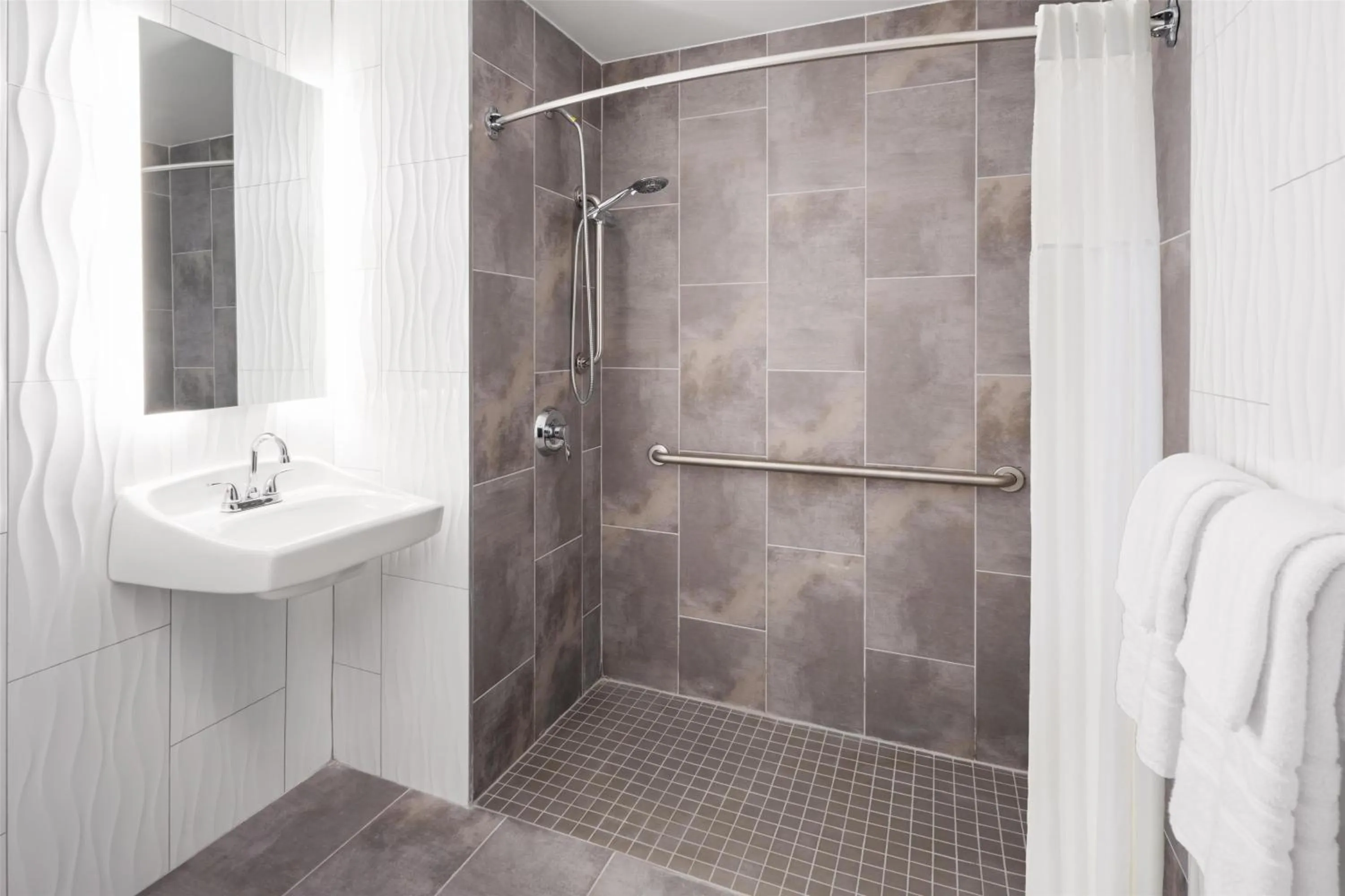 Bathroom in GLō Best Western Bronx NYC