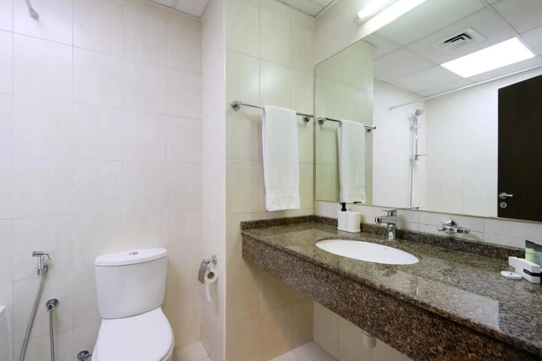 Toilet in Livbnb-Spacious JVC Studio, Near Dining and Shops