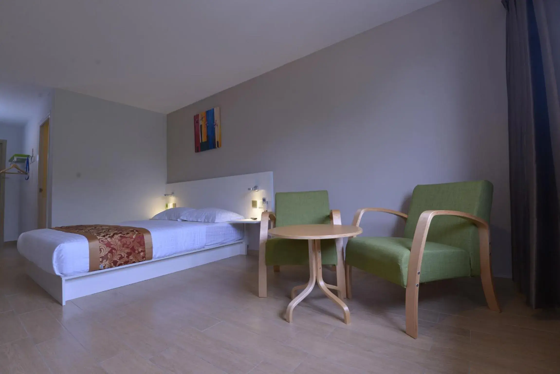 Seating area, Bed in Hotel Pintar Seating area, Bed in Hotel Pintar